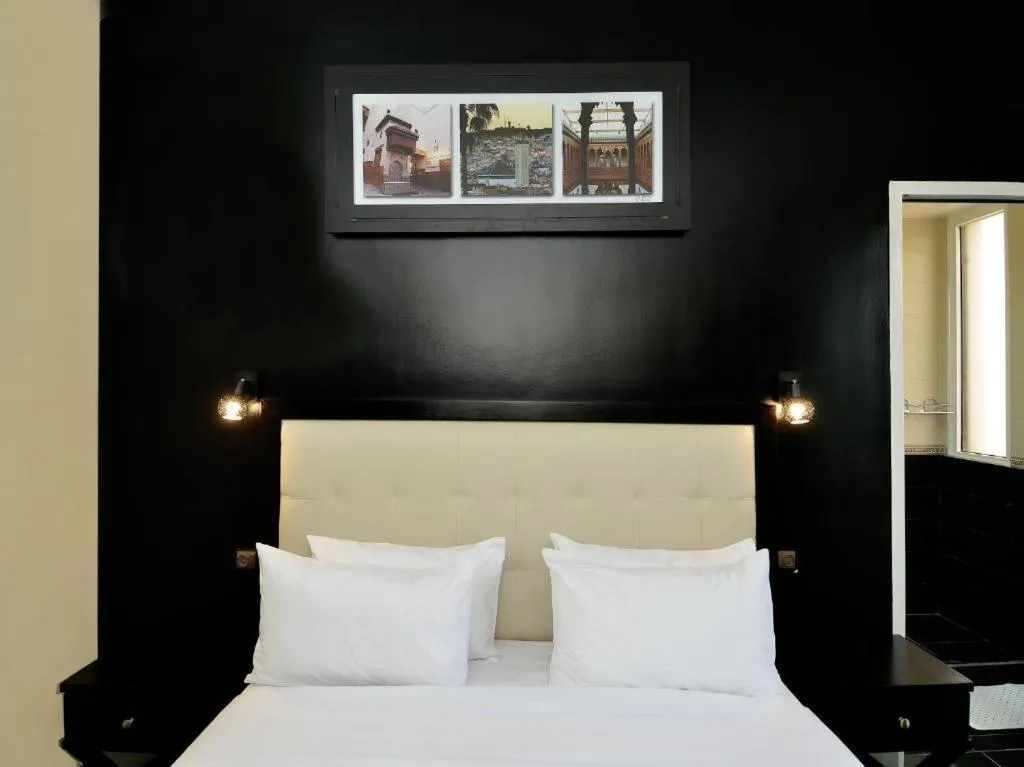 Bed in Amor Hotel