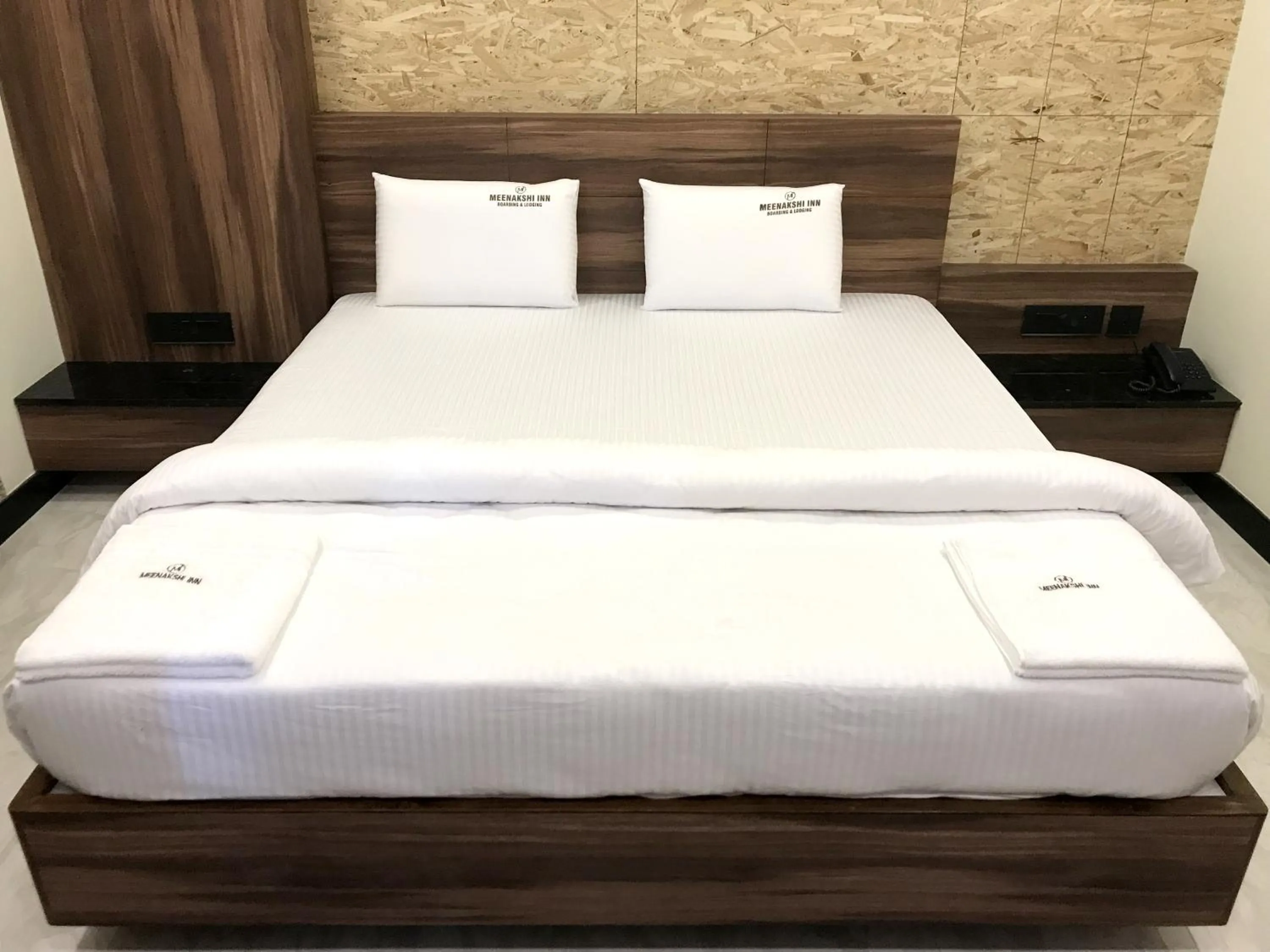 Bed in Meenakshi Inn