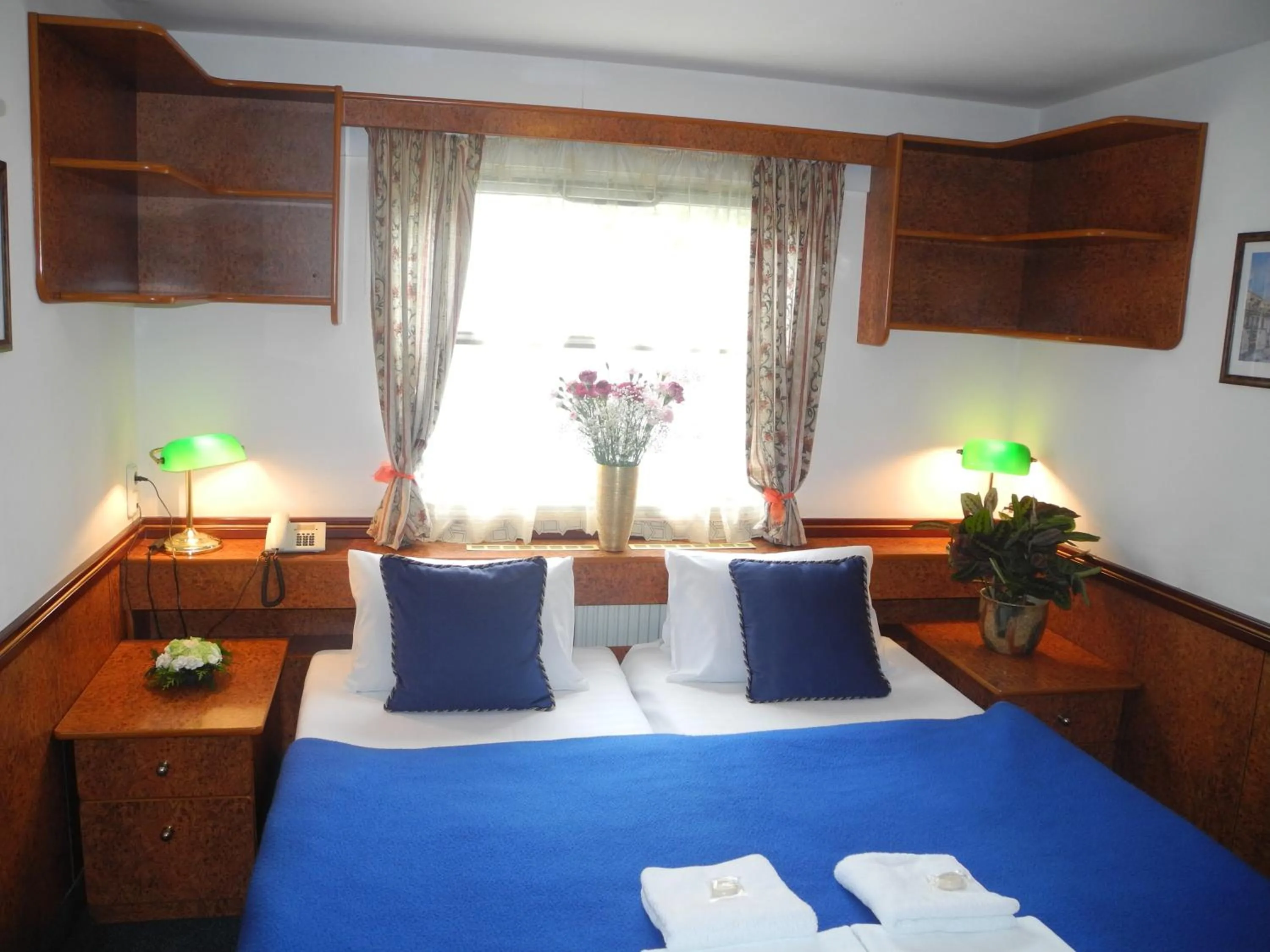 Photo of the whole room, Bed in Admiral Botel