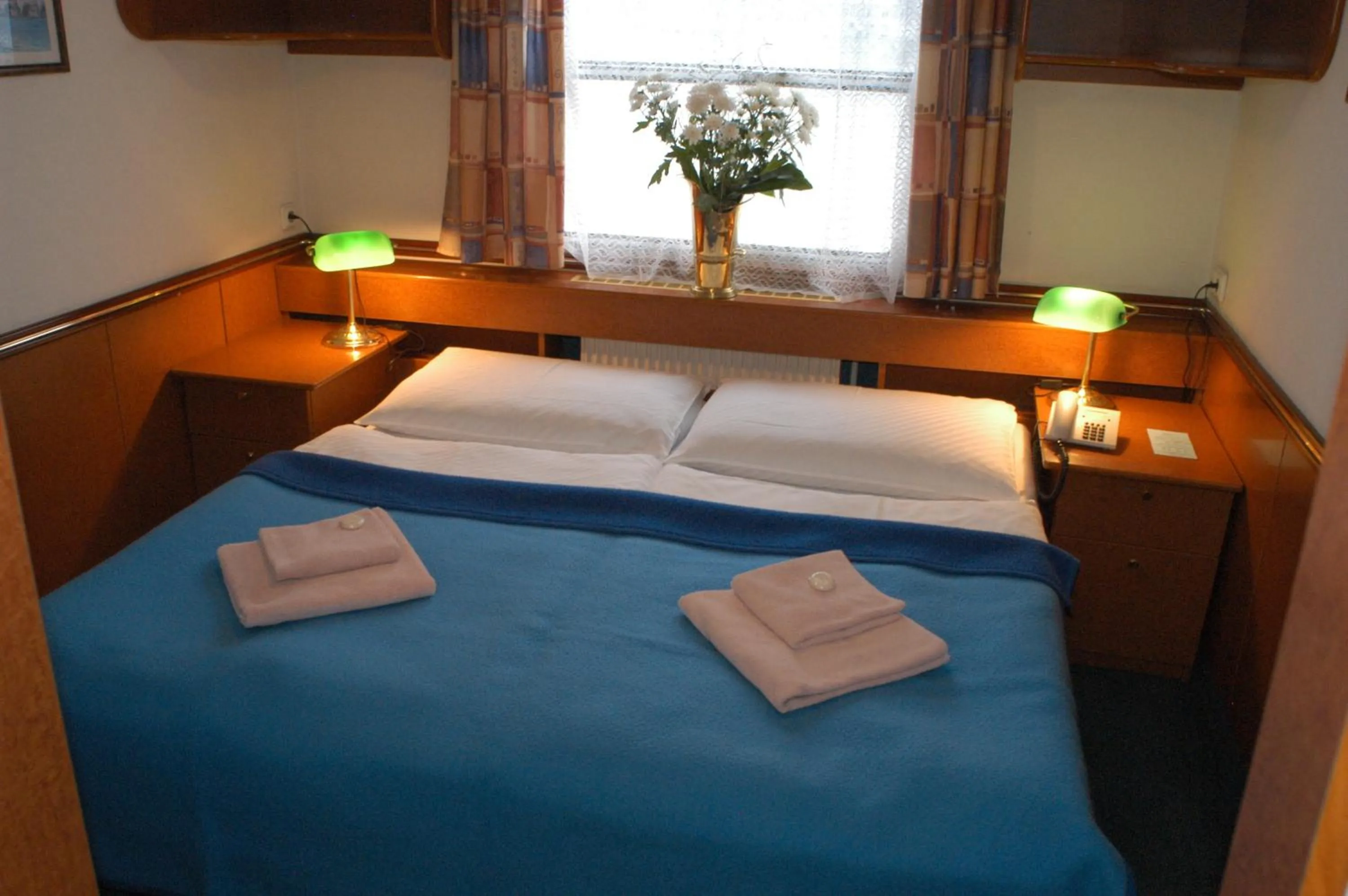 Photo of the whole room, Bed in Admiral Botel