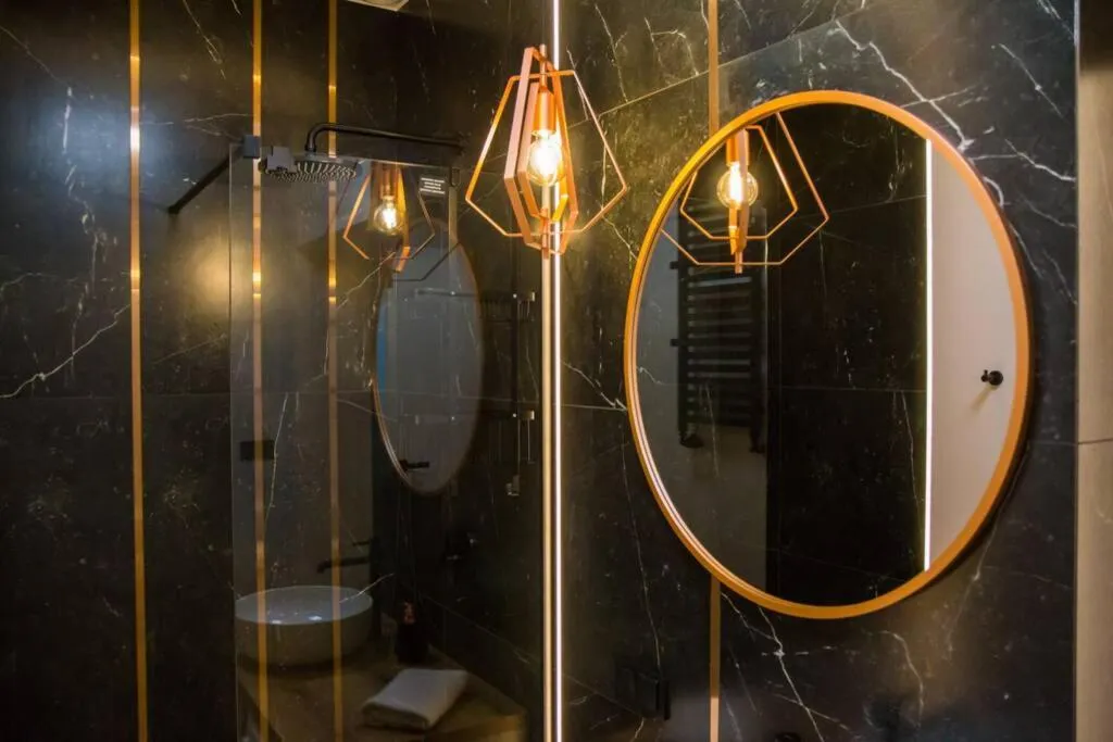 Bathroom in Miedziany by Rentoom