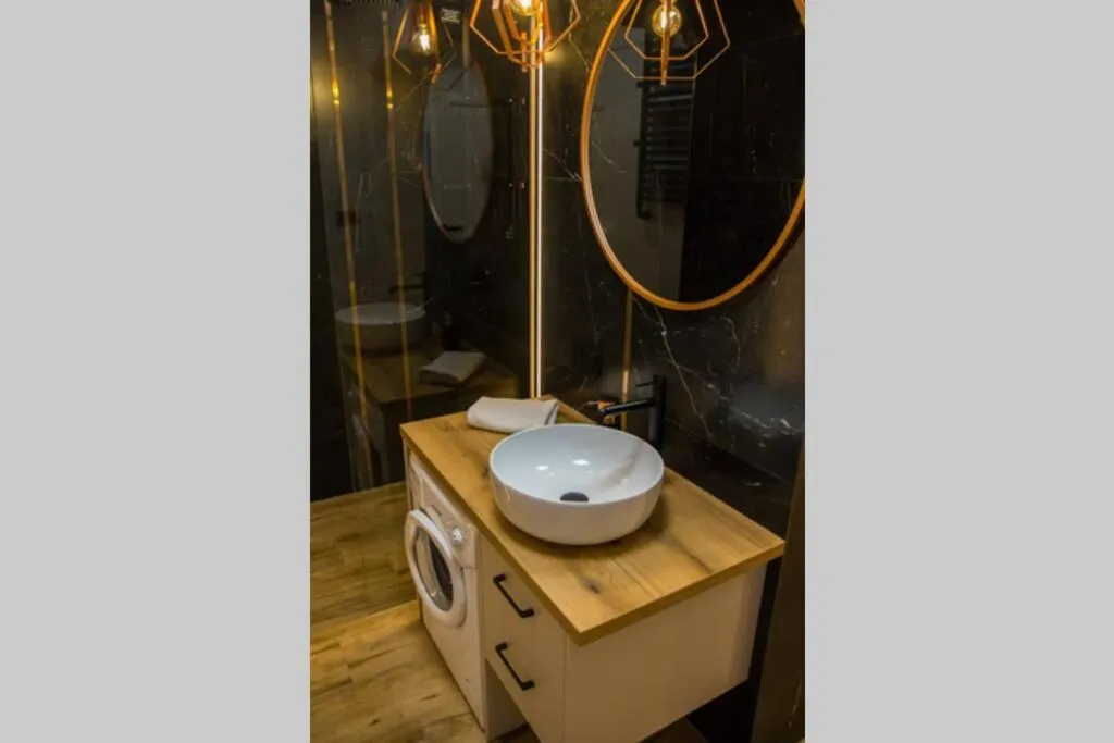 Bathroom in Miedziany by Rentoom