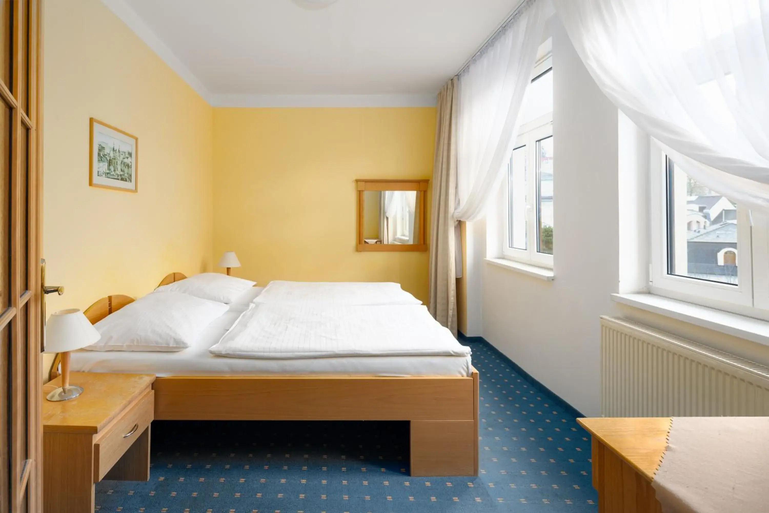 Triple Room with City View in Wellness Hotel Jean De Carro Triple Room with City View in Wellness Hotel Jean De Carro