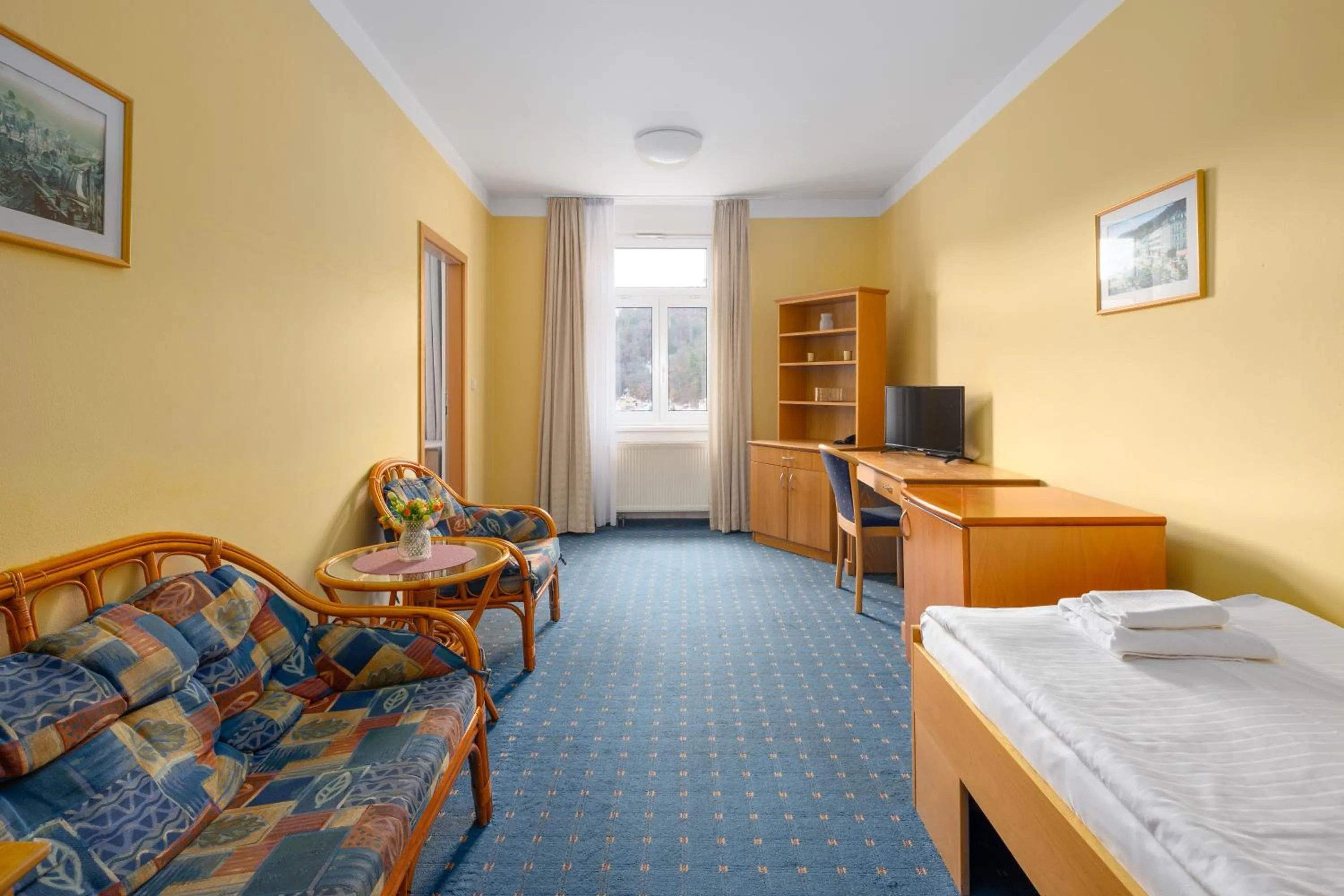 Seating area, Bed in Wellness Hotel Jean De Carro