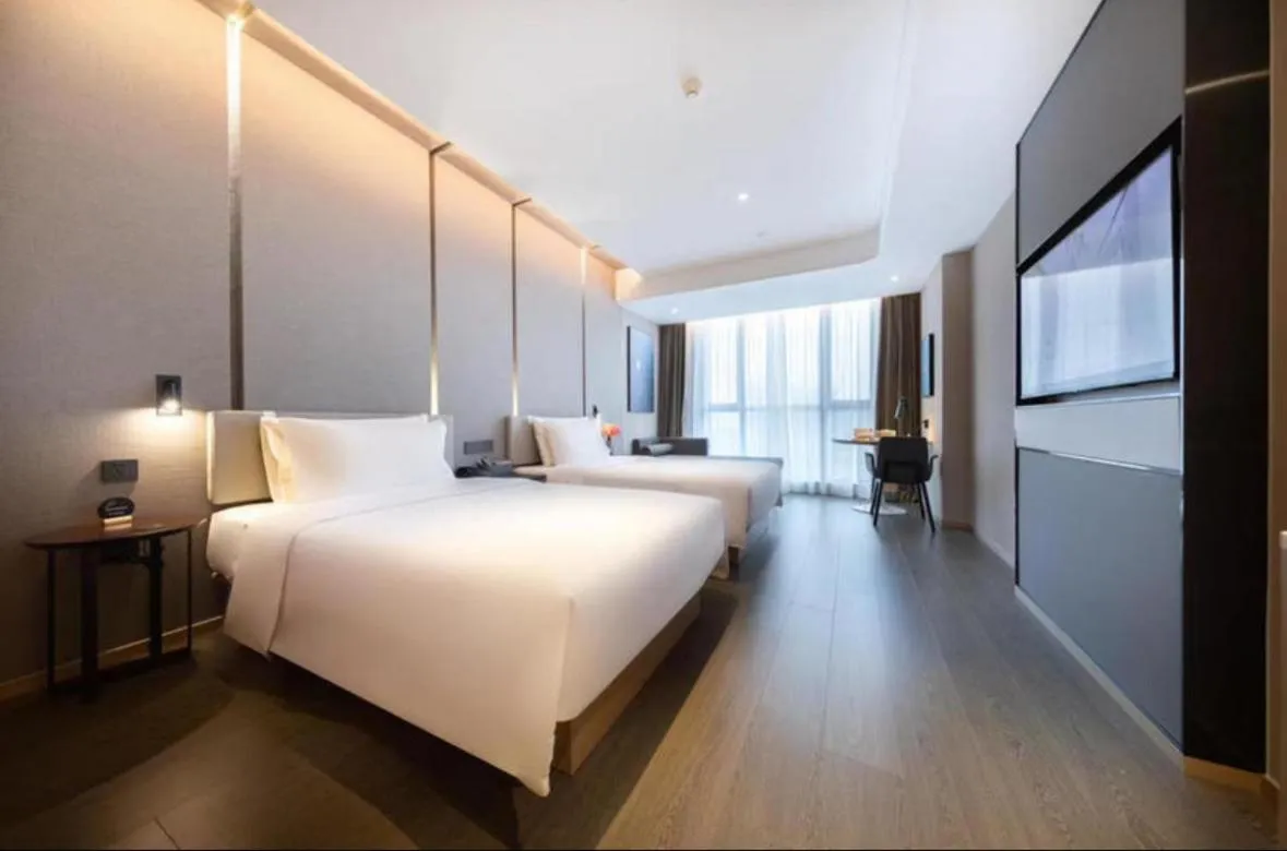 Photo of the whole room, Bed in Atour Hotel Ningbo Fenghua Huizheng Street