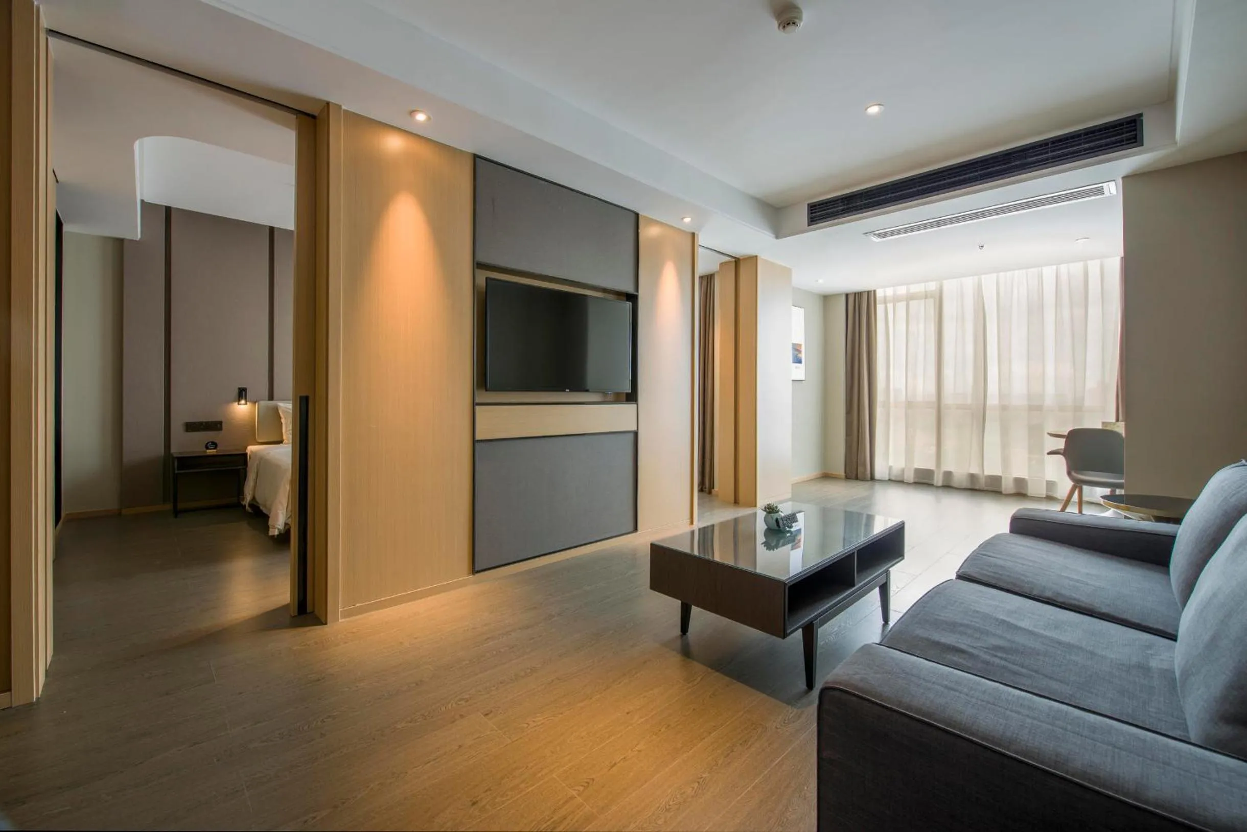 Living room, Bed in Atour Hotel Guangzhou Huadu Financial Center
