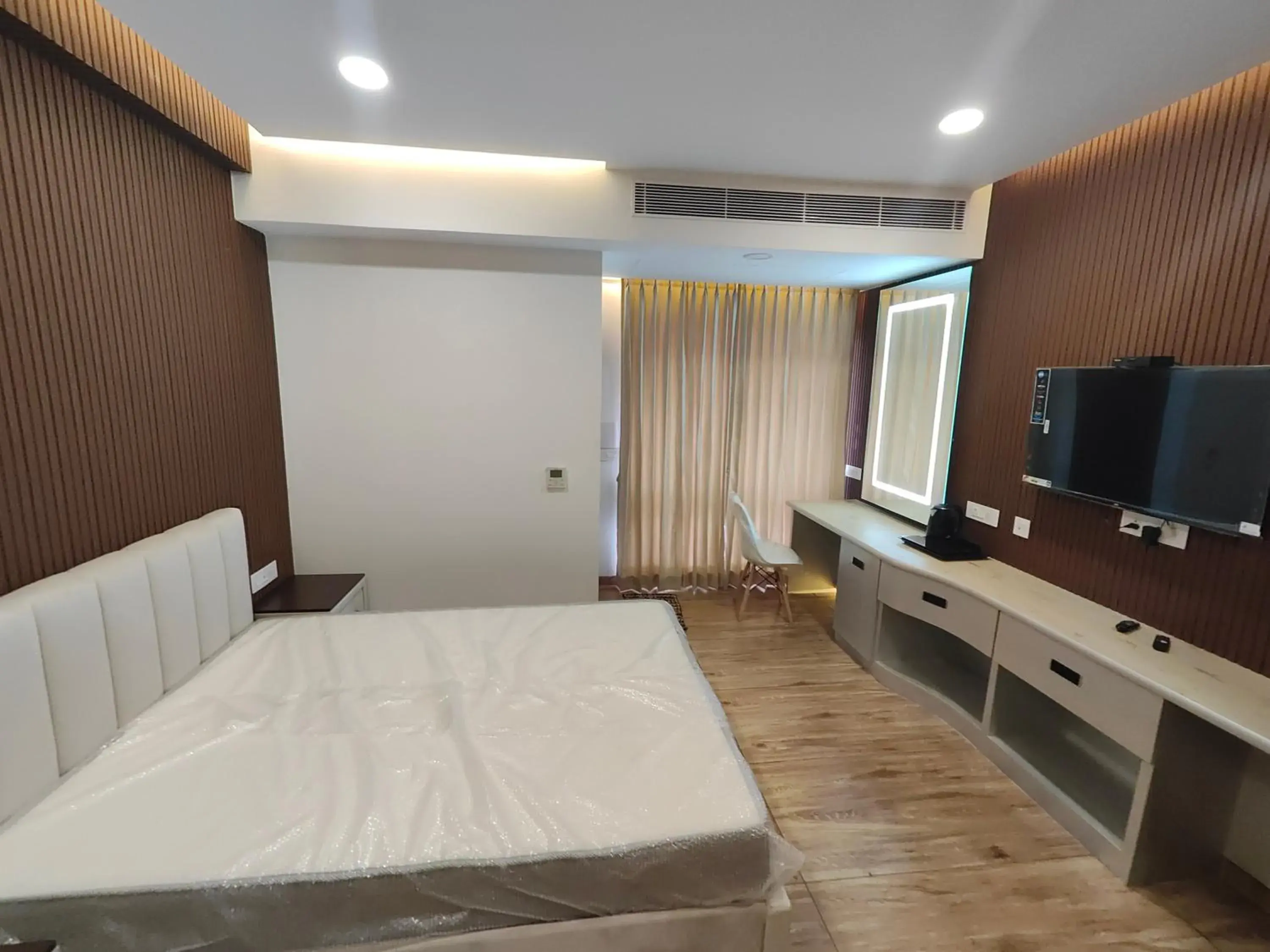 Bed in Hotel Geetha International Bed in Hotel Geetha International