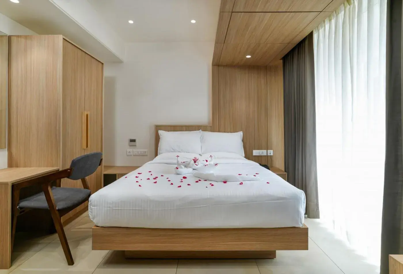 Bed in The Trios Hotel Bed in The Trios Hotel