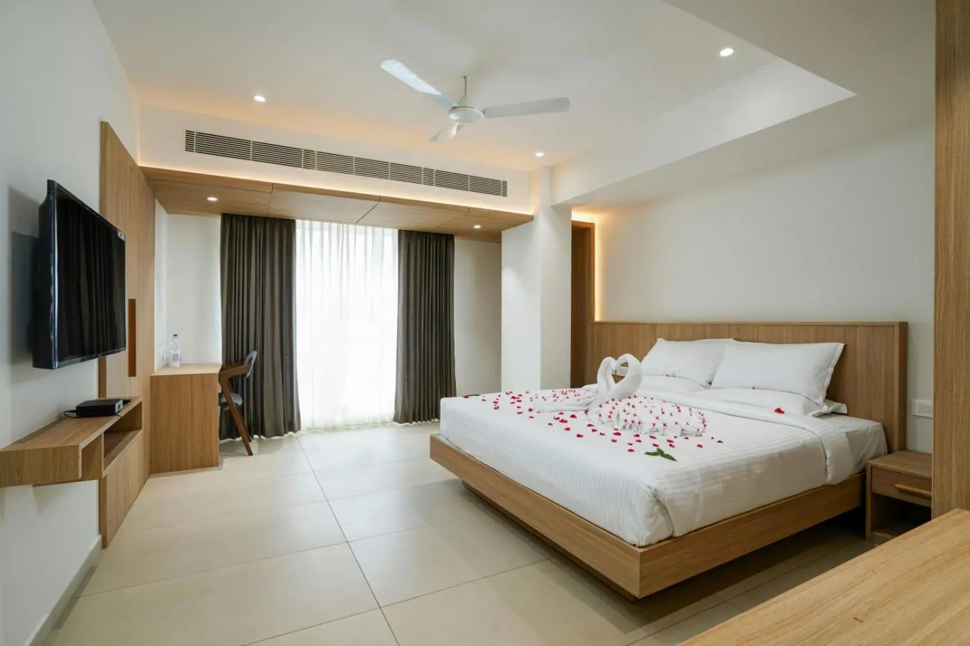 Bed in The Trios Hotel