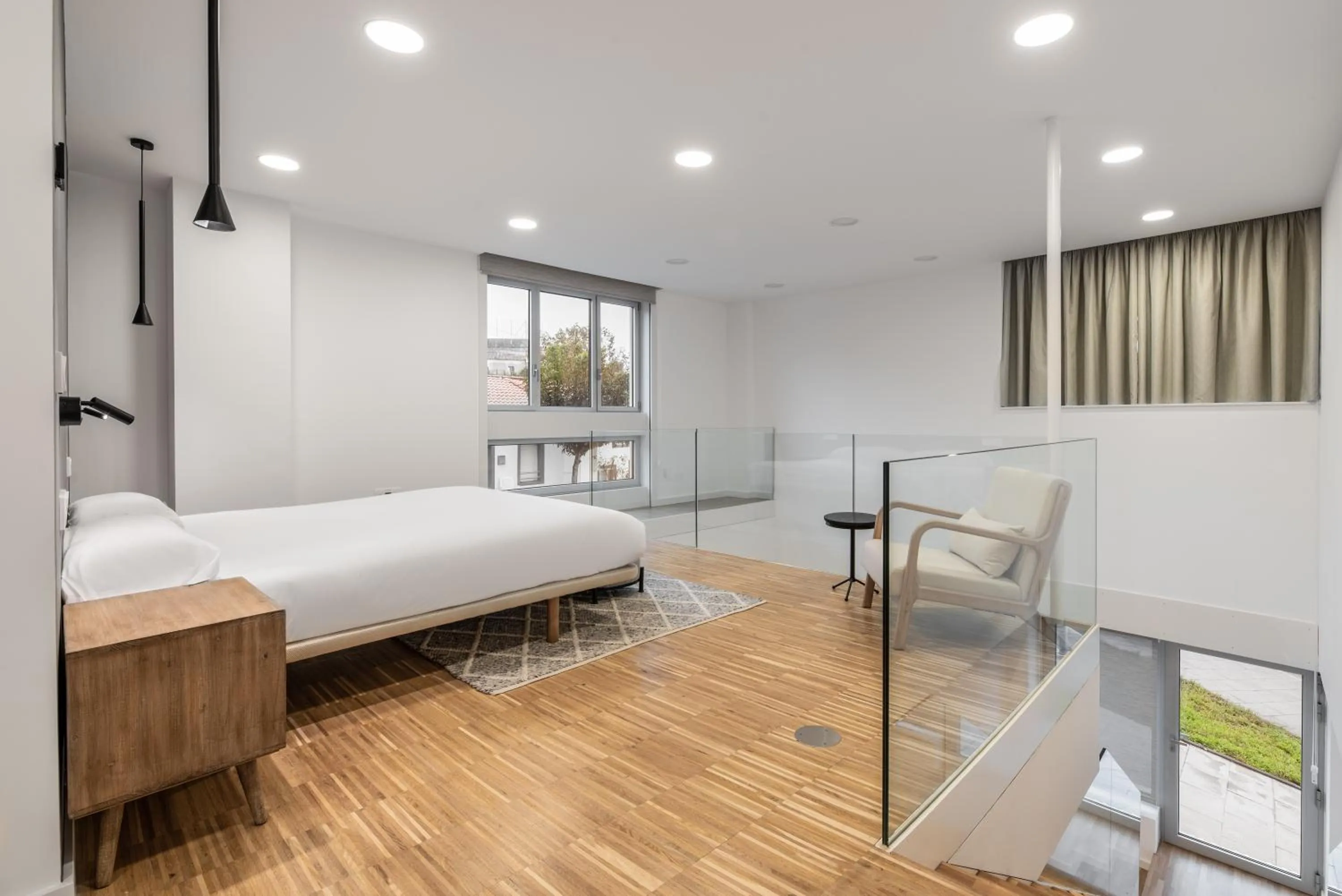 Bed in I Loft Santiago by Upper Luxury Housing