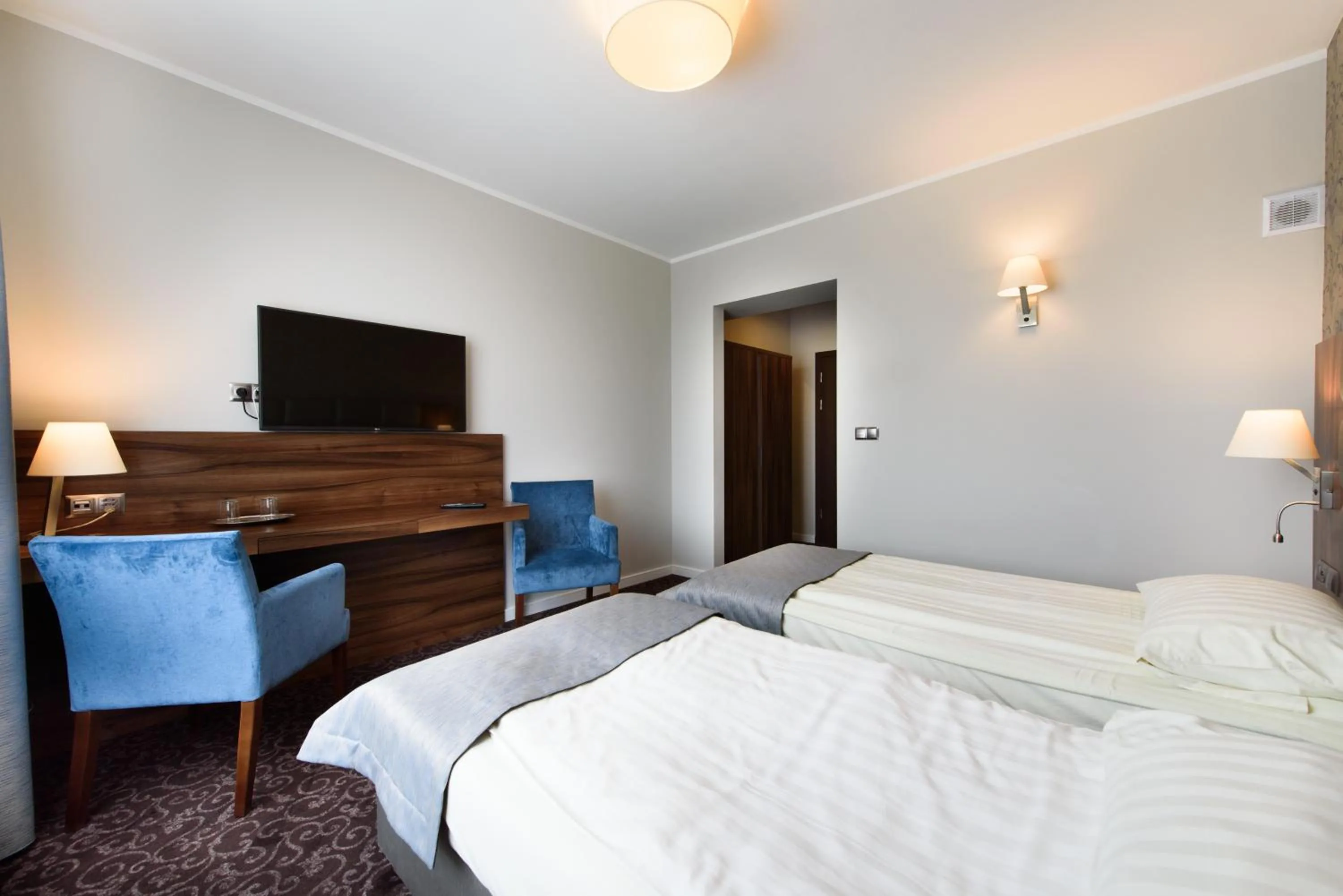 Bed in Hotel Nowy Dwór