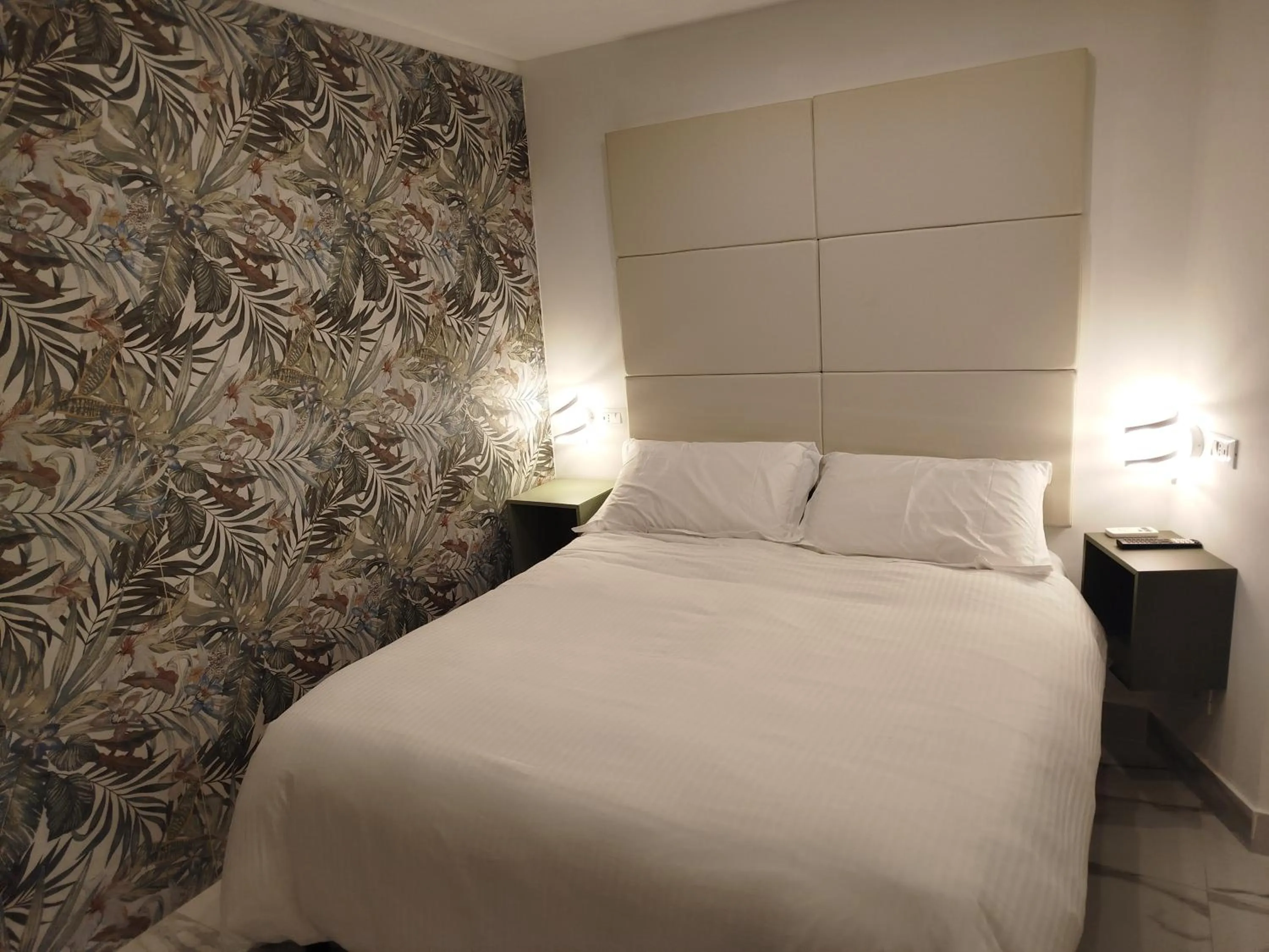 Bed in Confort Suites