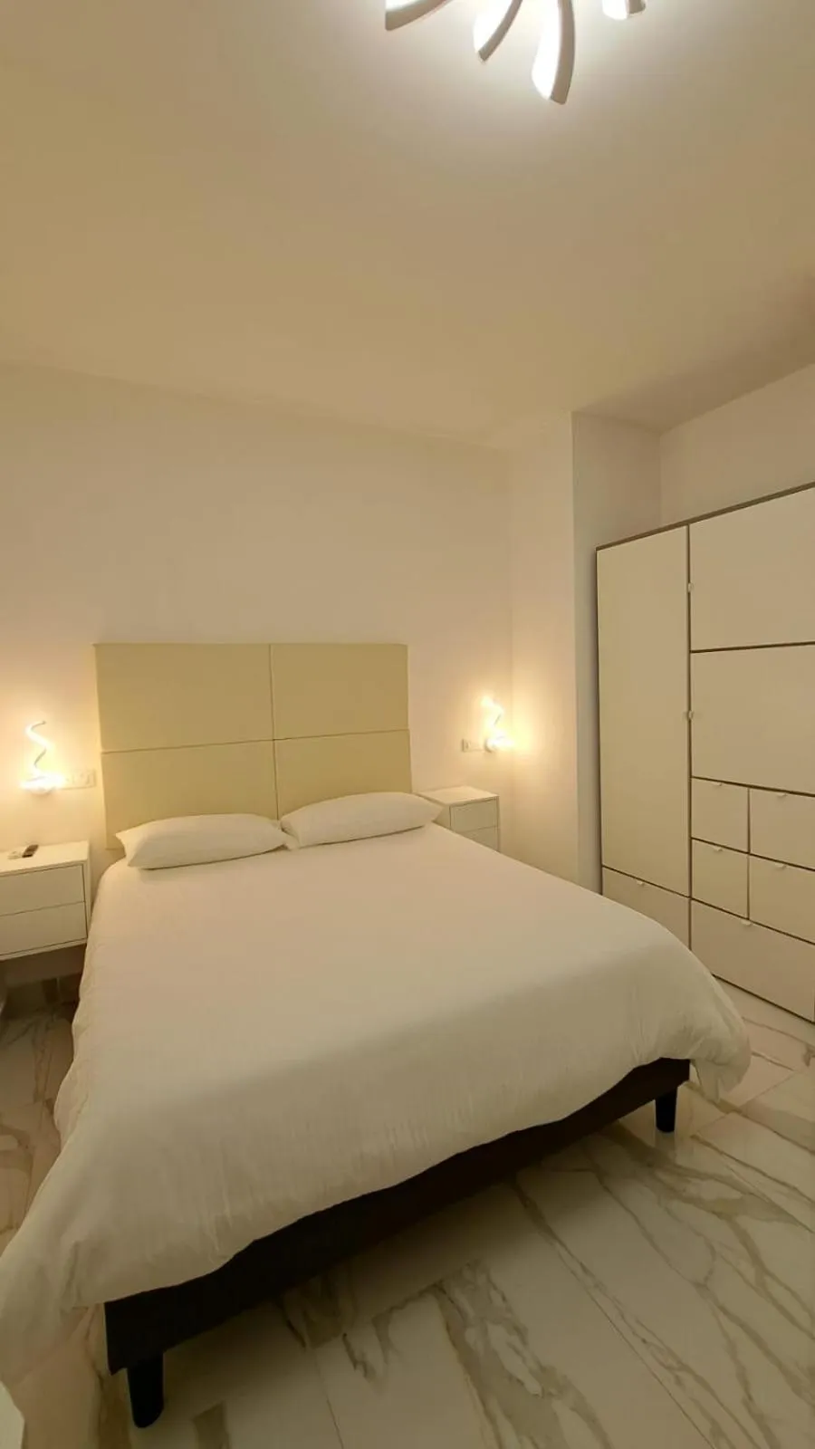 Bed in Confort Suites