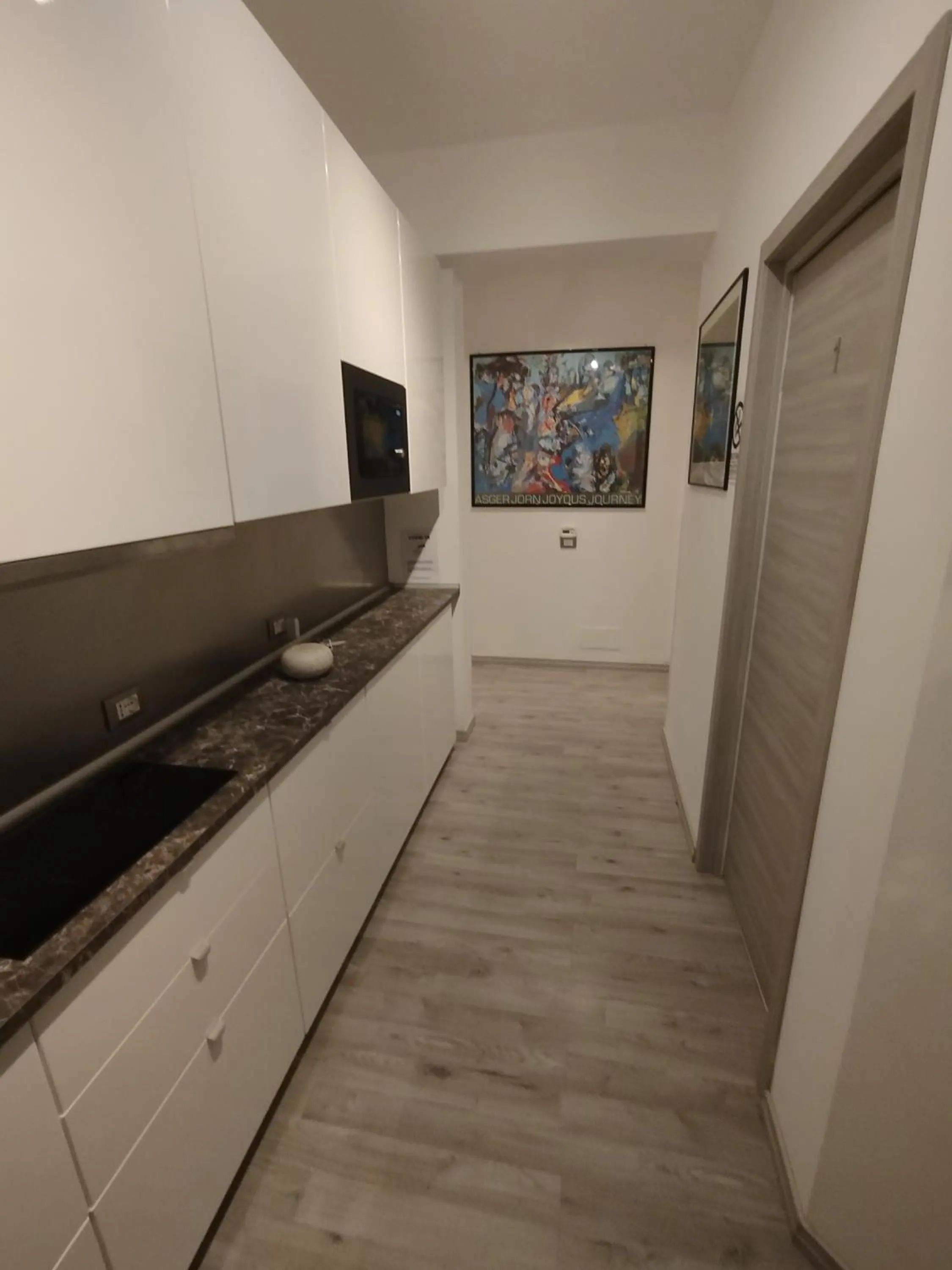 Kitchen or kitchenette in Confort Suites