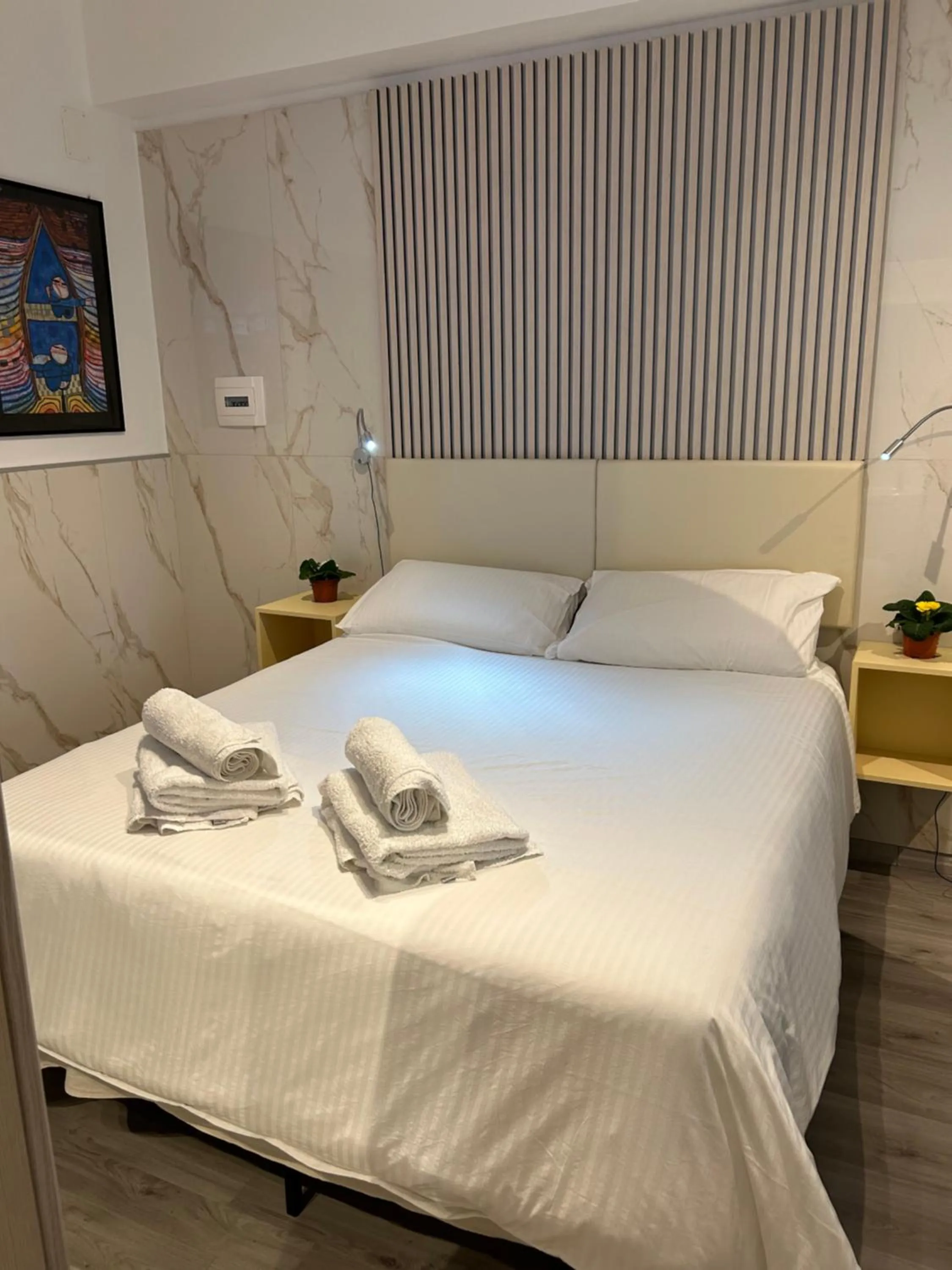 Bed in Confort Suites