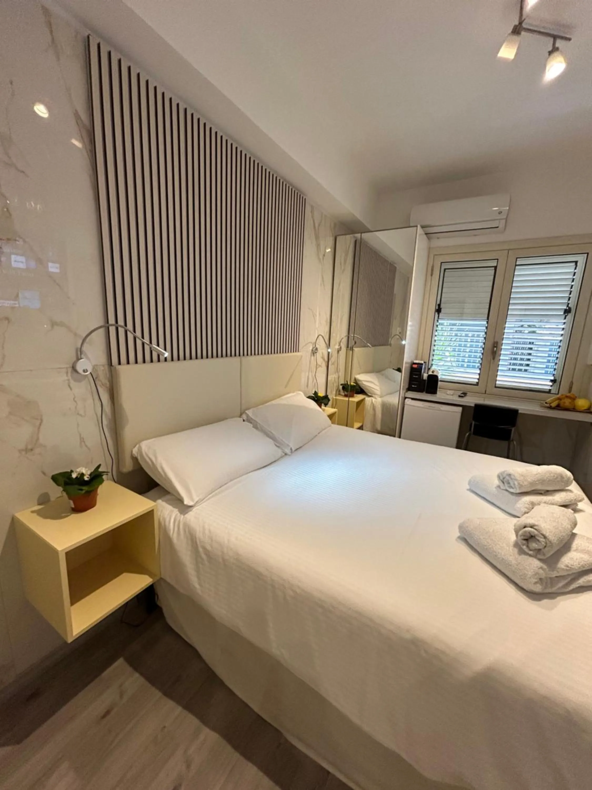 Bed in Confort Suites