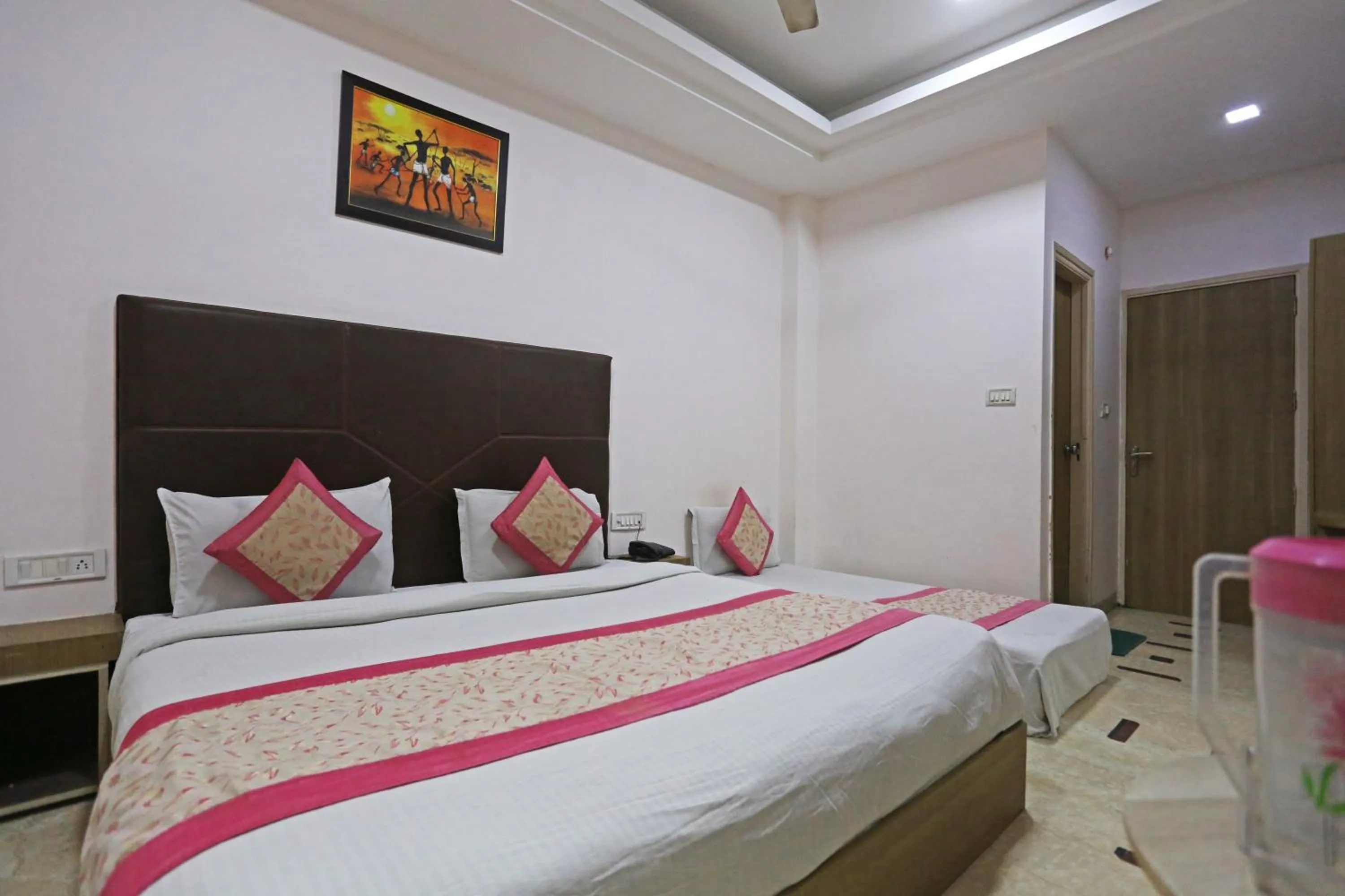 Bed in Hotel Sterling Inn, New Delhi