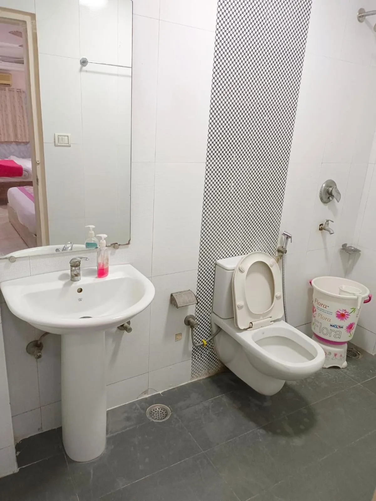 Bathroom in Hotel Sterling Inn, New Delhi