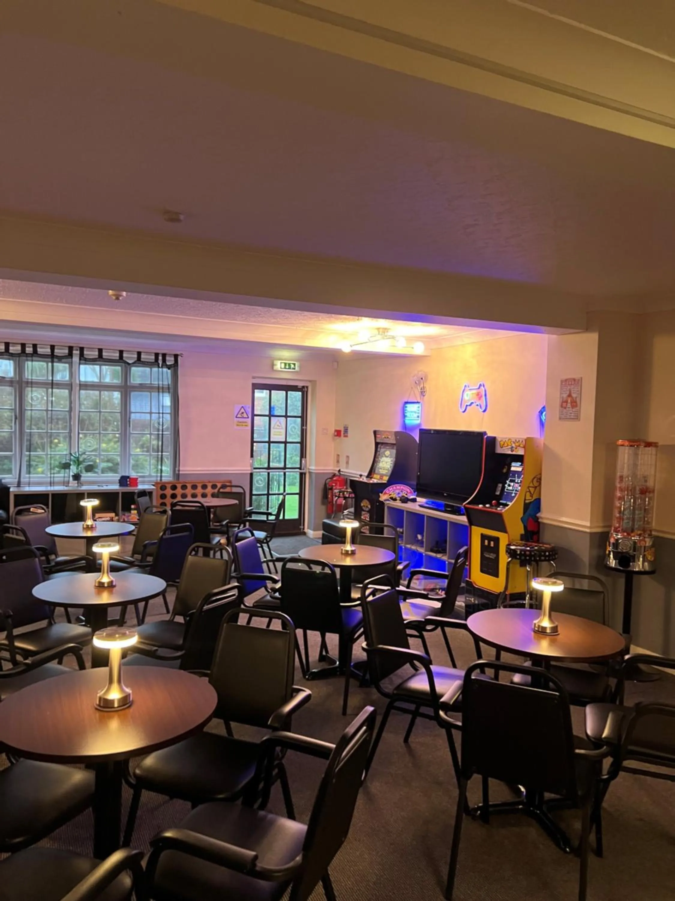 Communal lounge/ TV room in Burlington Hotel