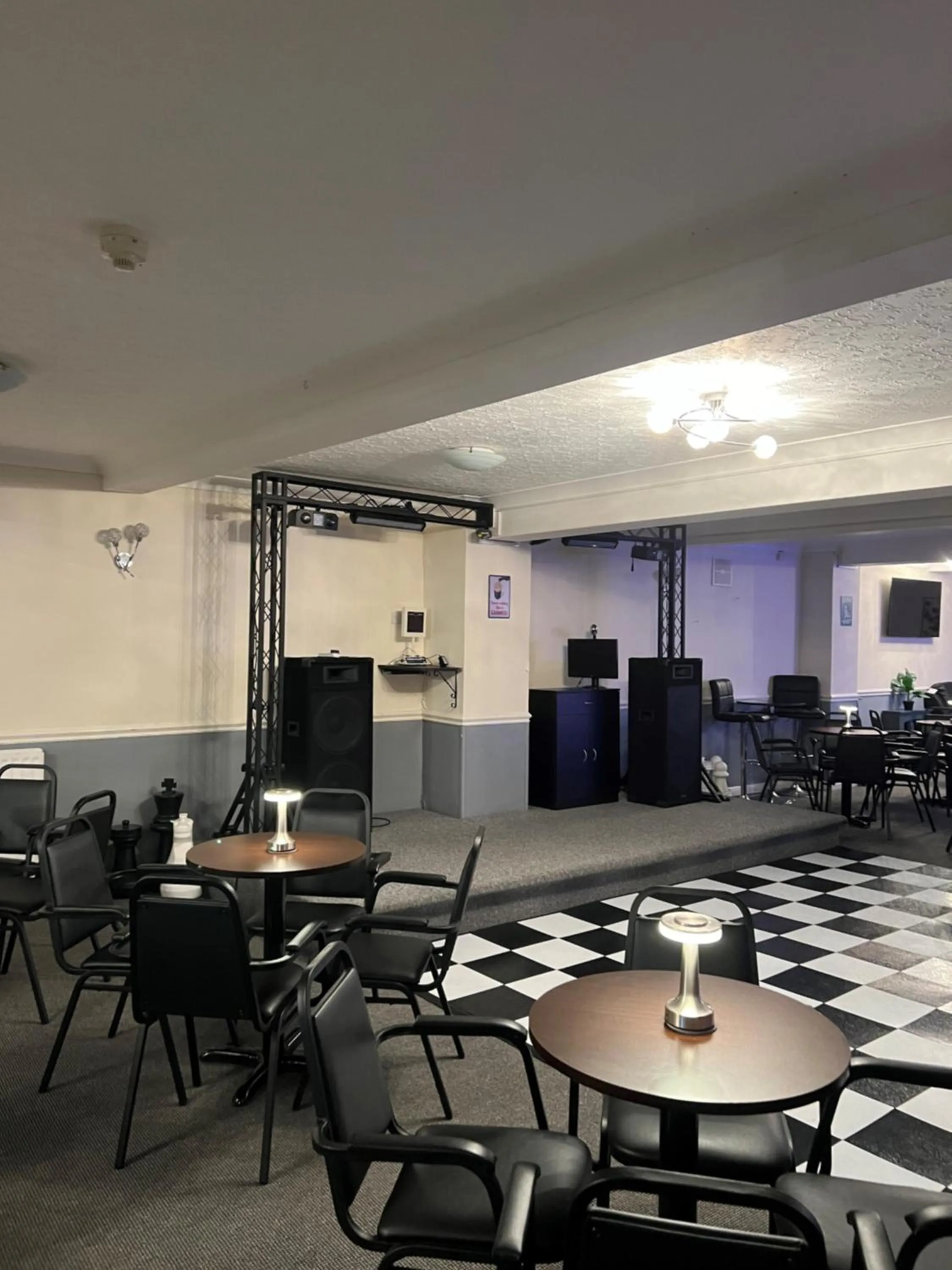 Communal lounge/ TV room in Burlington Hotel