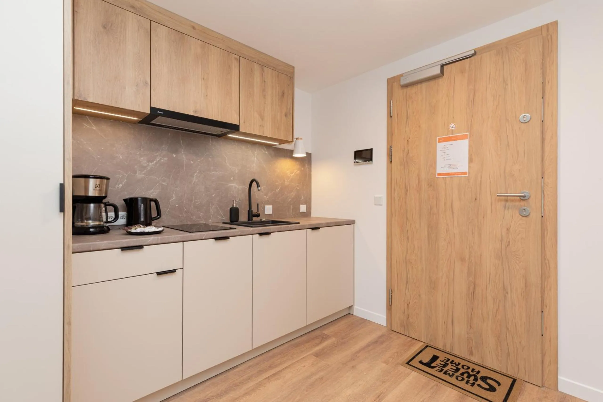 Kitchen or kitchenette in Apartamenty Jantaris by Noclegi Renters