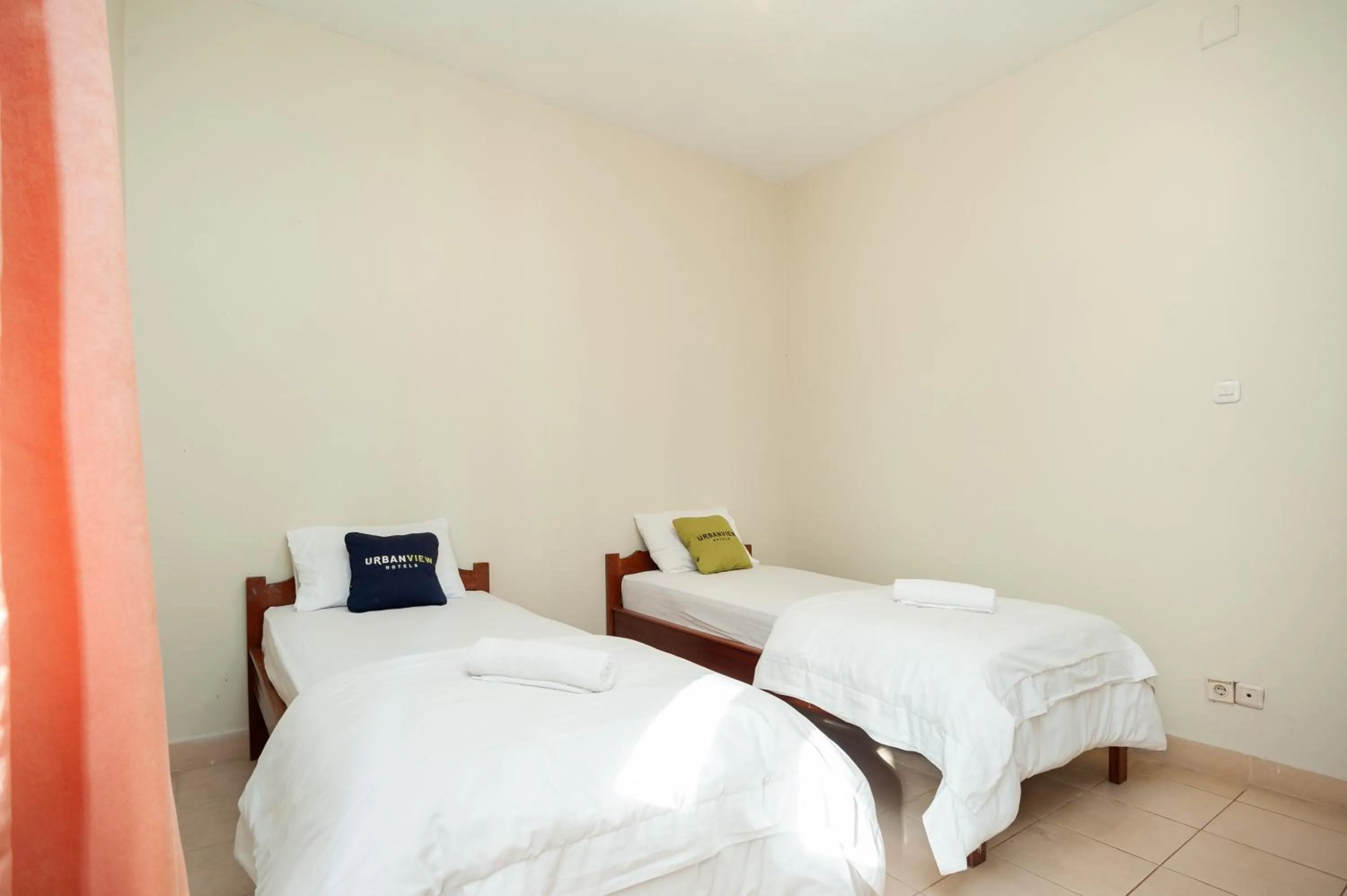 Bedroom, Bed in Urbanview Hotel Syariah Insani Cisarua Puncak