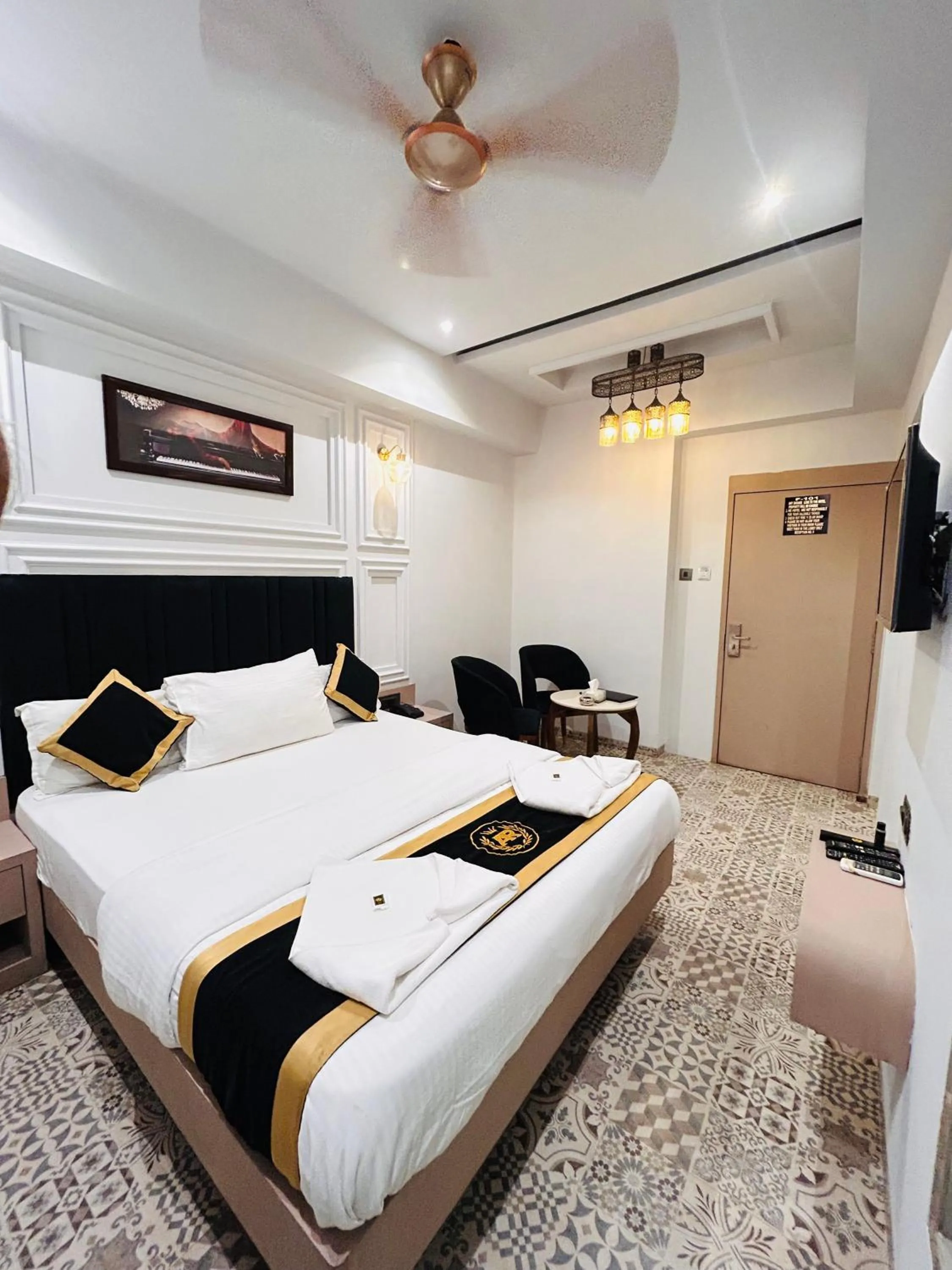 Bed in Hotel AR Residency