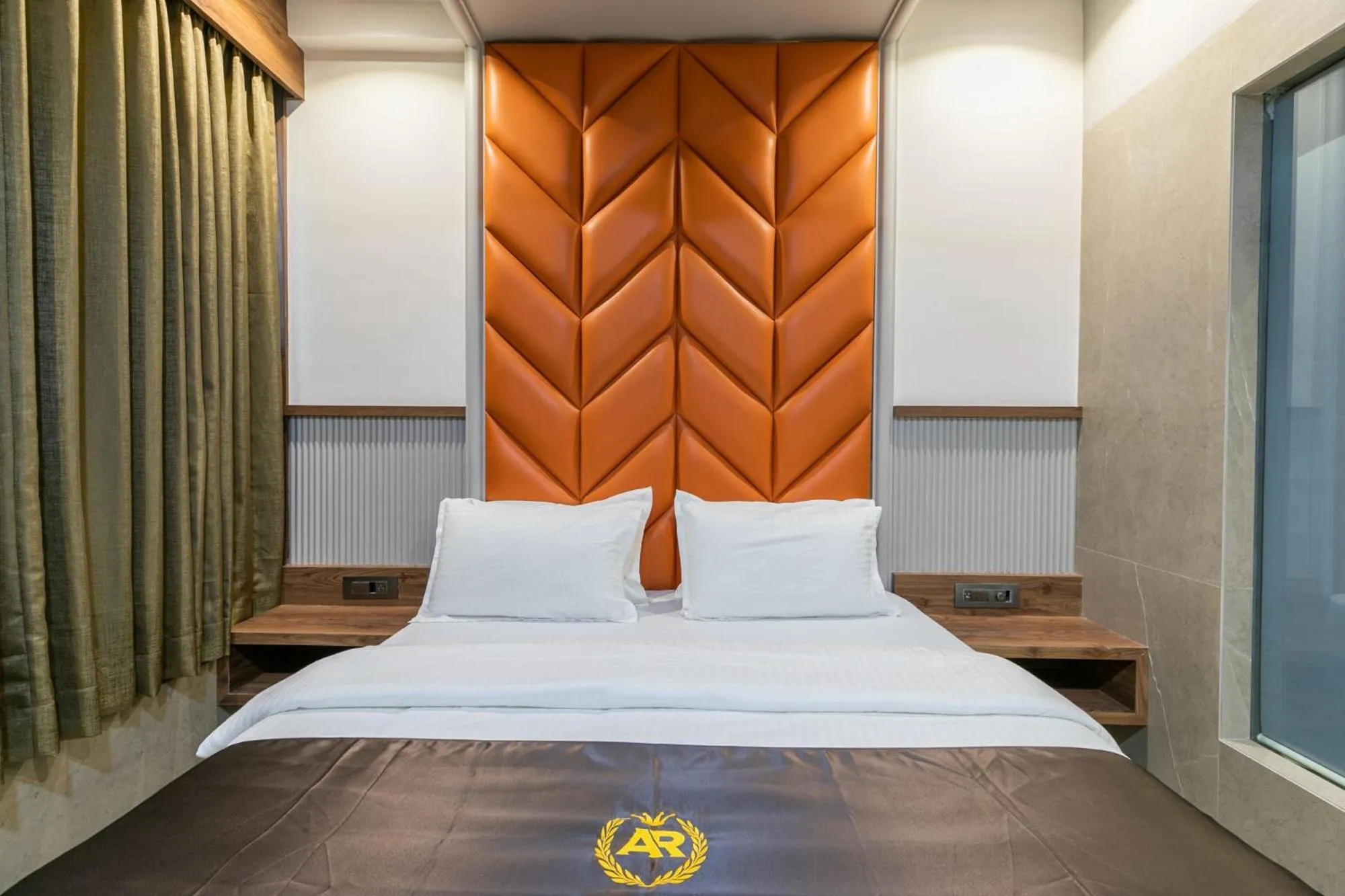 Bed in Hotel AR Residency