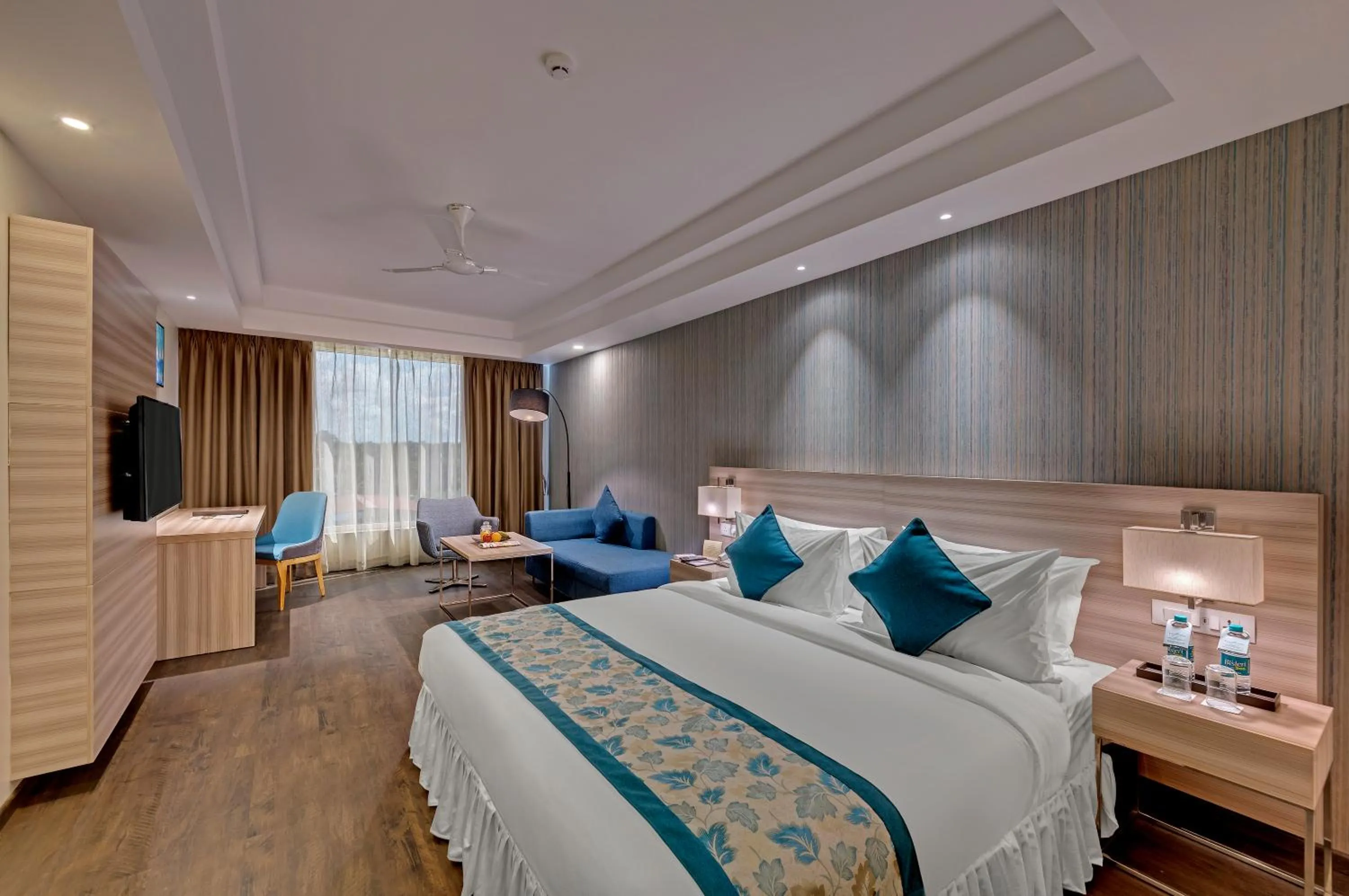 Photo of the whole room, Bed in The Fern Residency Hubballi