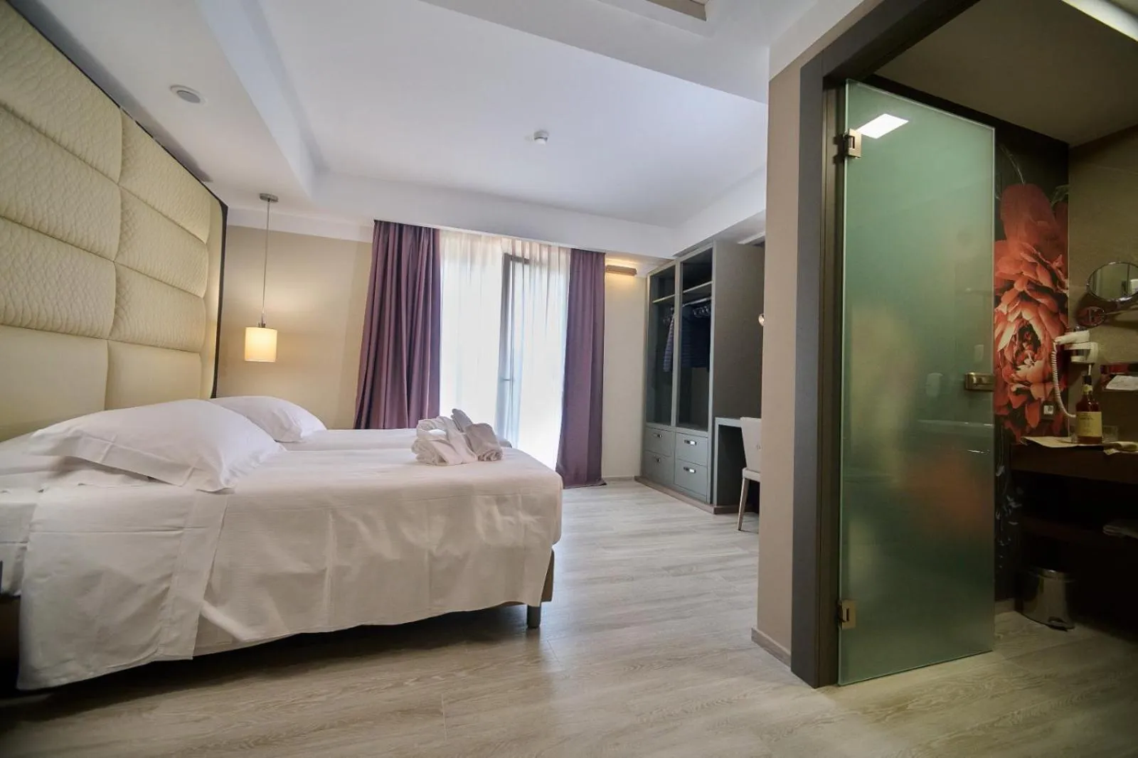 Bed in PARK HOTEL LE DUNE DI GIOVINO