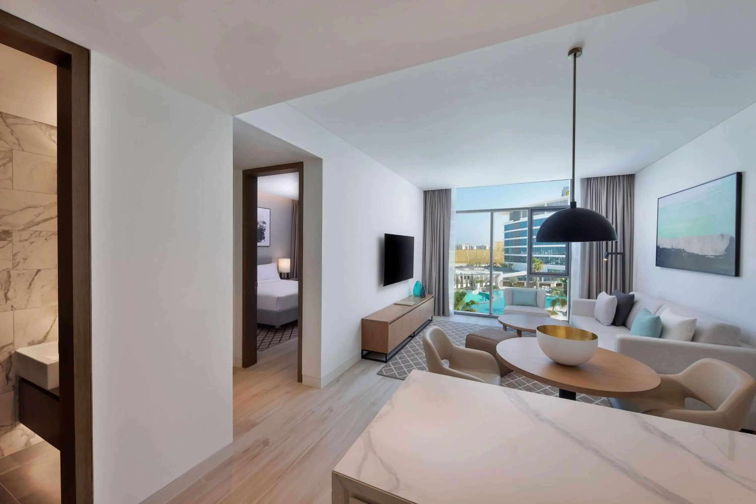 Living room, Bed in Doubletree By Hilton Abu Dhabi Yas Island Residences
