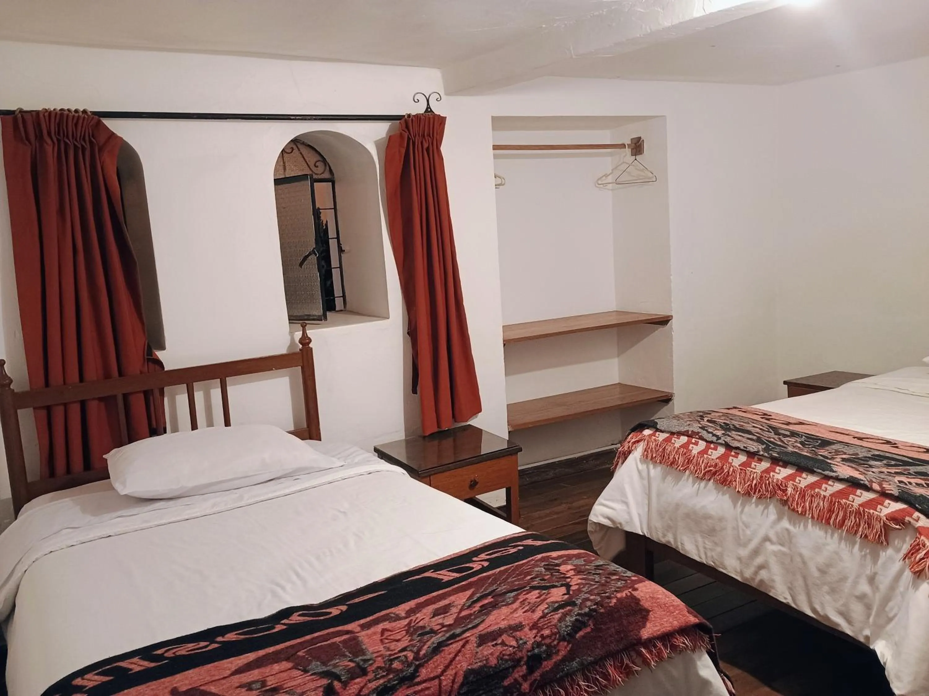 Bed in Posada Catama INN