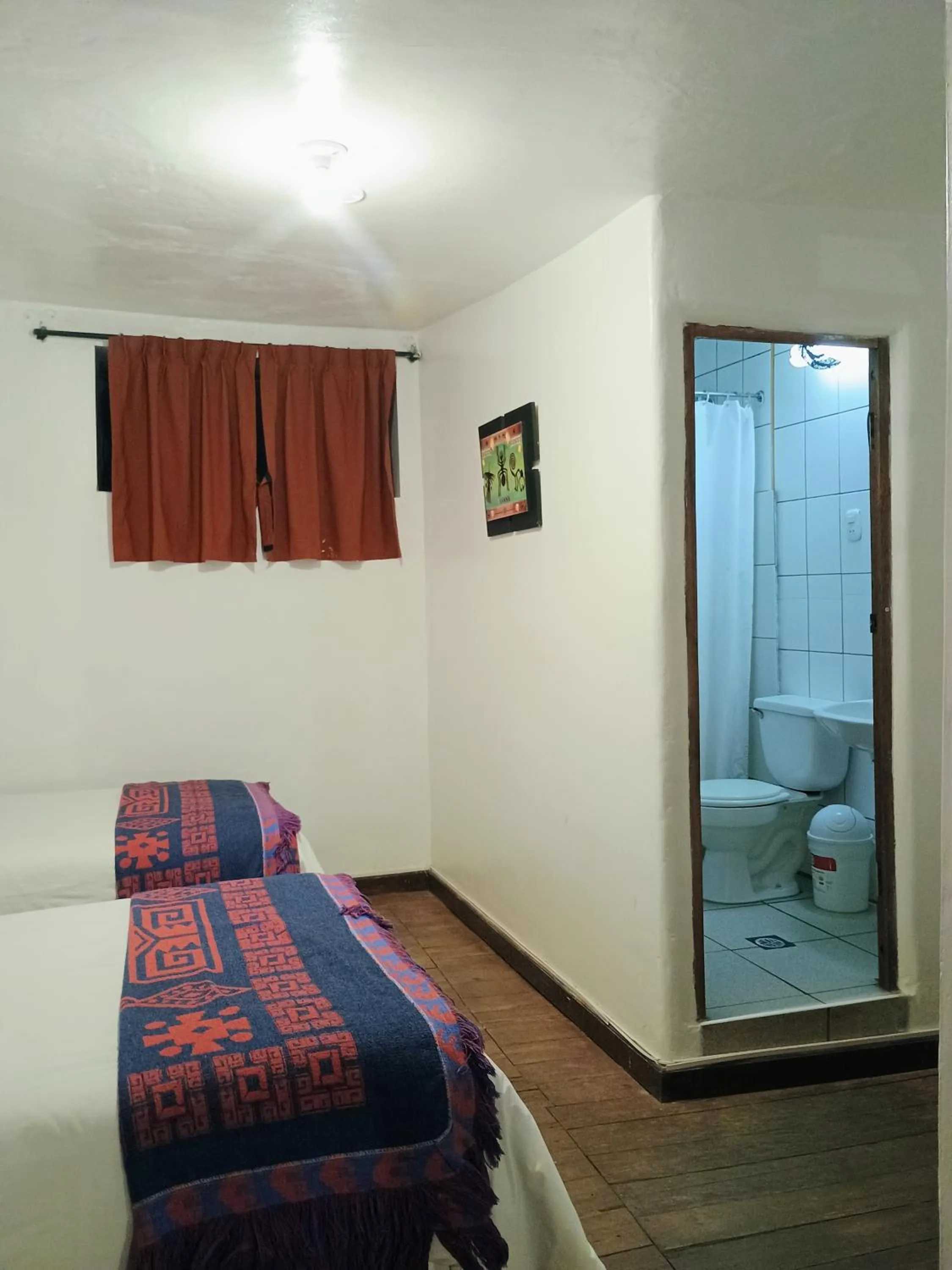 Bed in Posada Catama INN