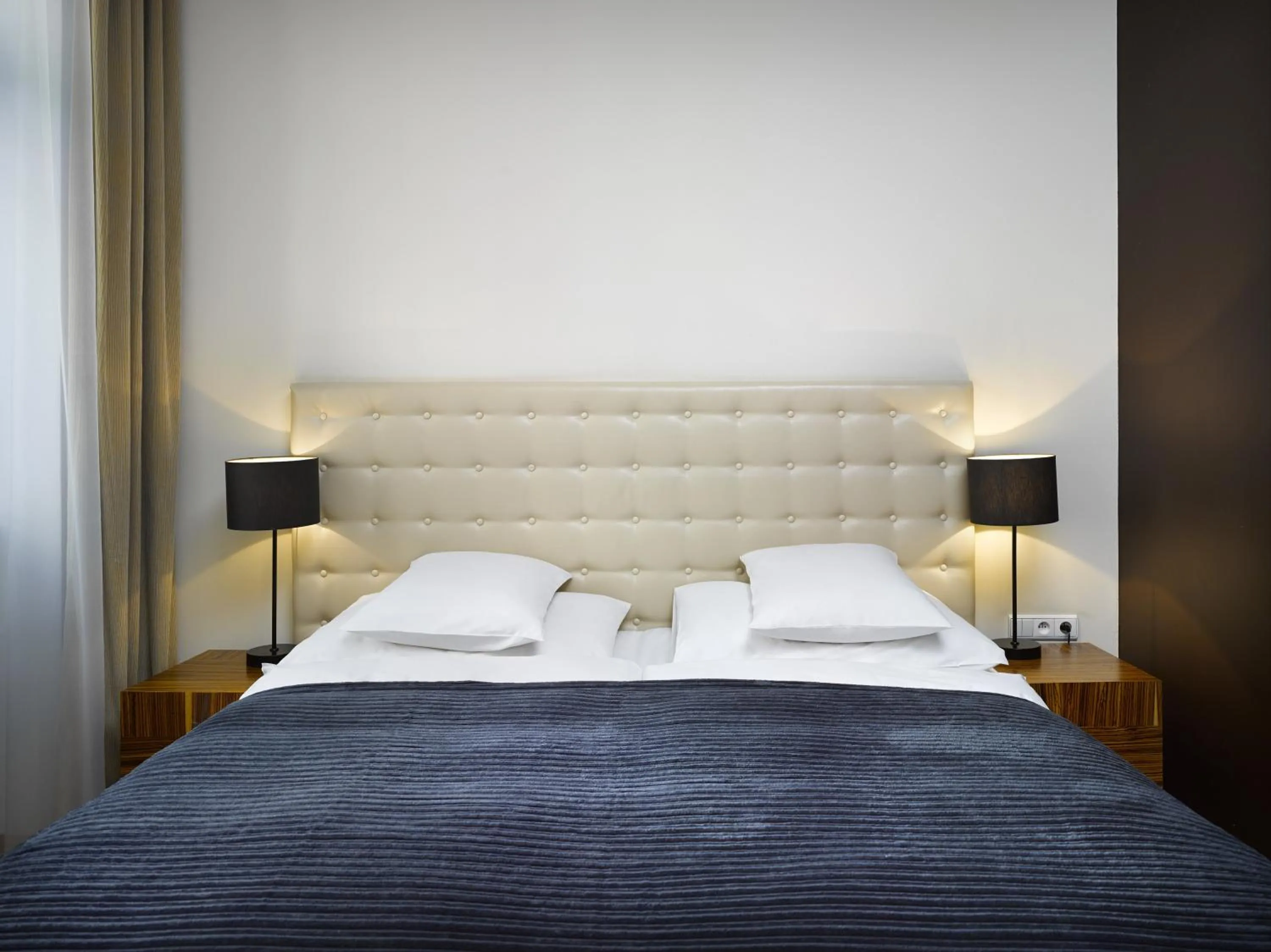 Bed in The ICON Hotel