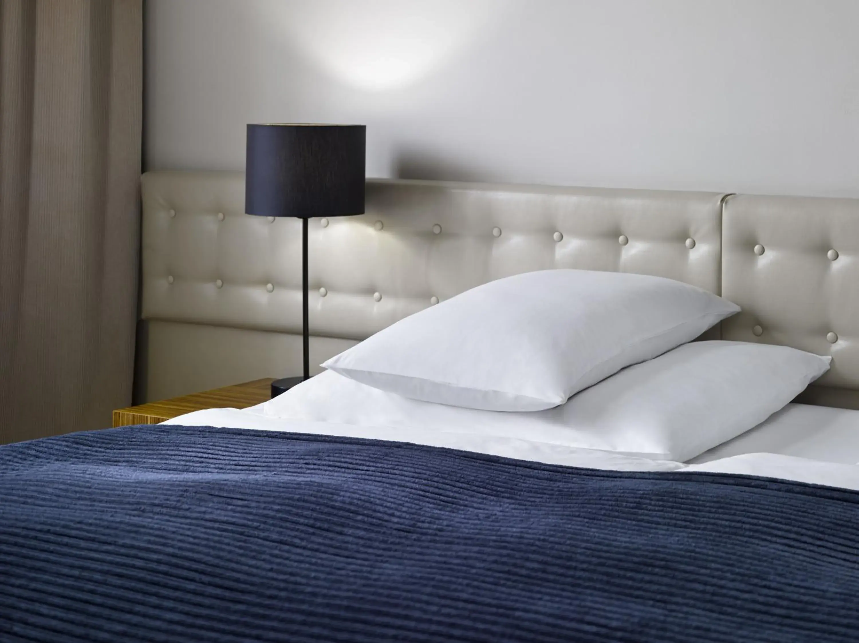 Bed in The ICON Hotel Bed in The ICON Hotel