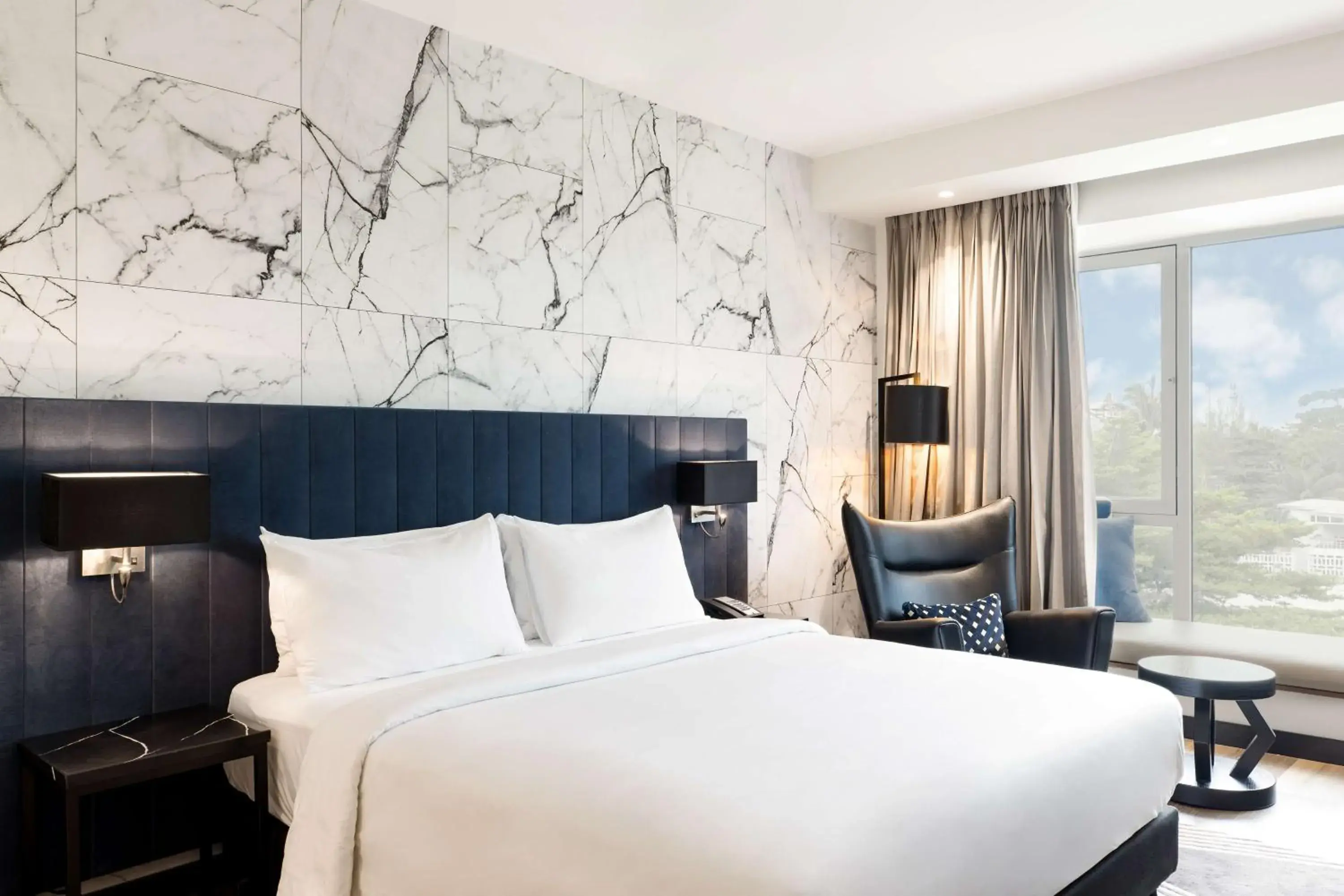 Photo of the whole room, Bed in Radisson Blu Anchorage Hotel Photo of the whole room, Bed in Radisson Blu Anchorage Hotel