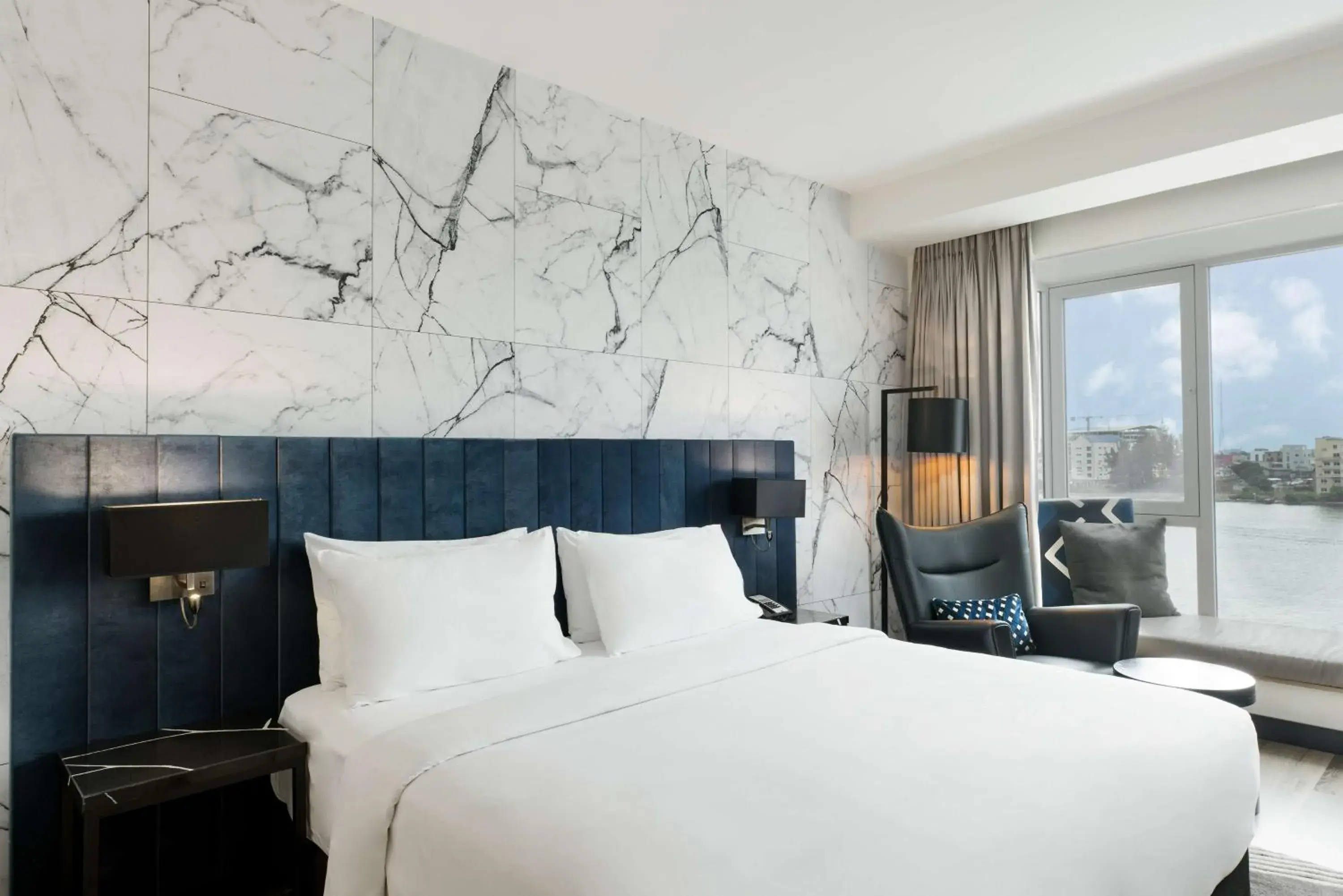 Photo of the whole room, Bed in Radisson Blu Anchorage Hotel Photo of the whole room, Bed in Radisson Blu Anchorage Hotel