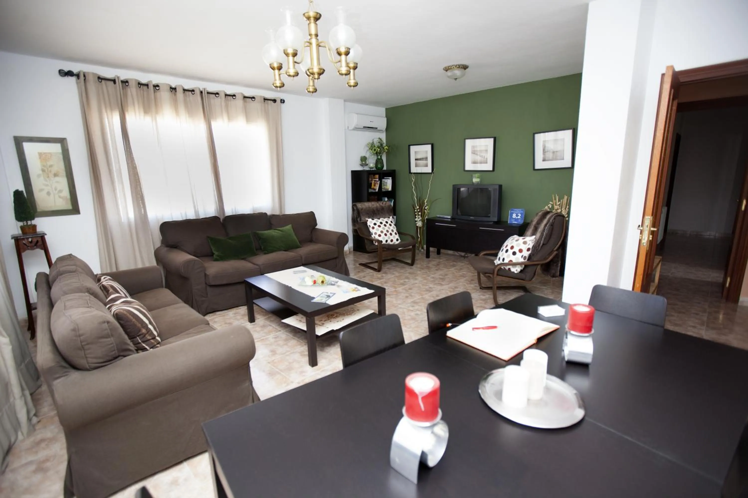 Communal lounge/ TV room in Apartamento Turístico La Ribera del Marco
