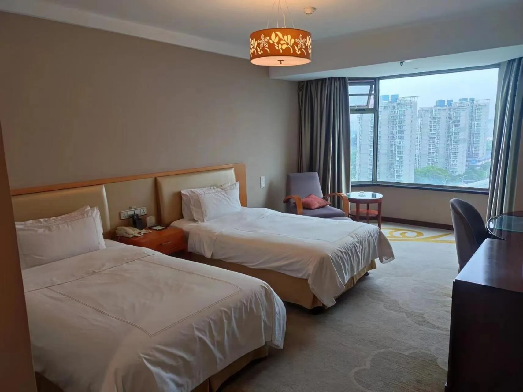 Photo of the whole room, Bed in Shu Guang International Hotel