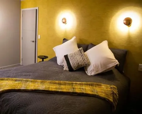 Bed in Tongariro Suites
