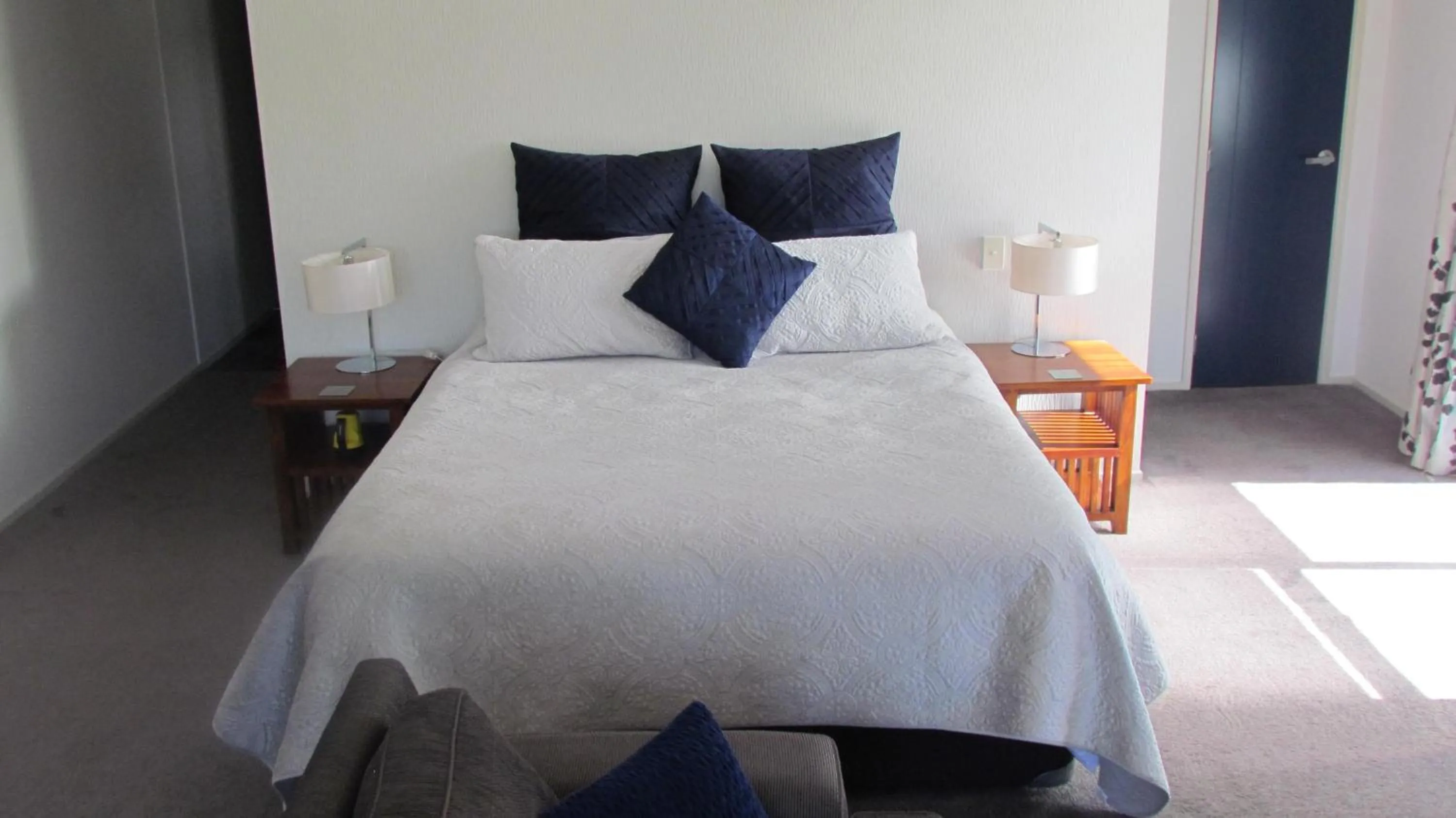 Bed in Tongariro Suites