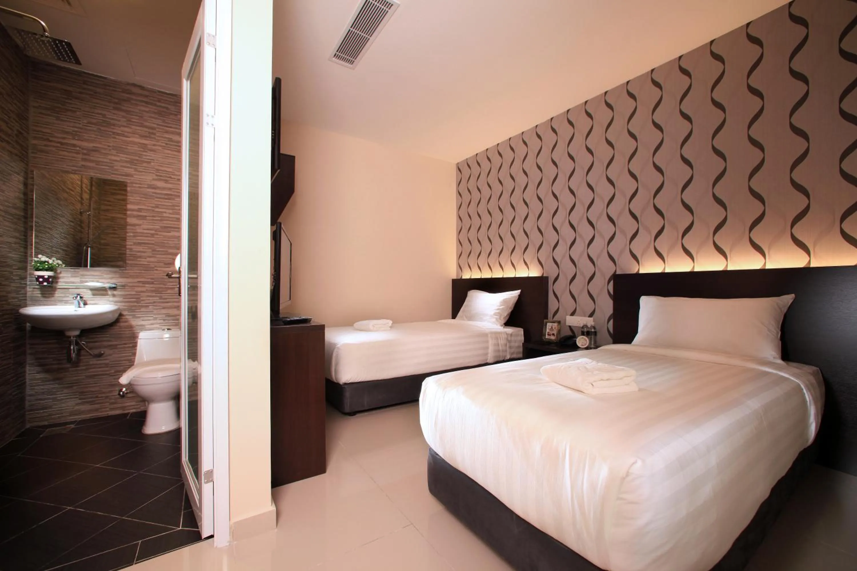 Bed in Izumi Hotel Bukit Bintang Kuala Lumpur