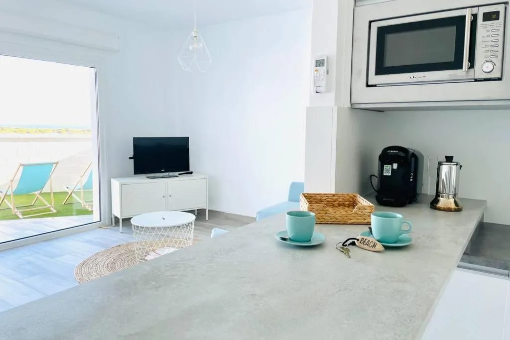 Precioso apartamento con vistas parciales, garaje y piscina