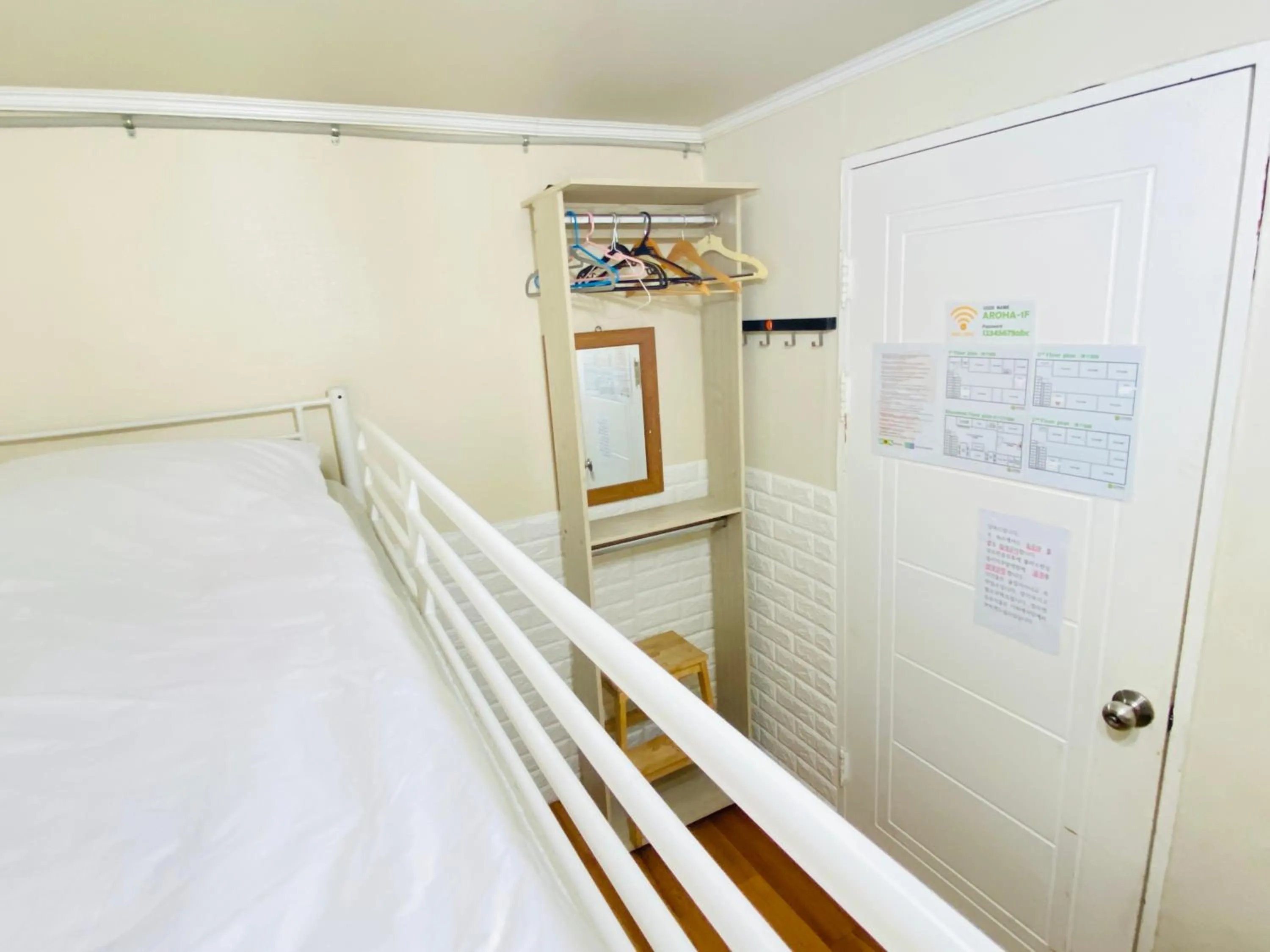 Photo of the whole room, Bed in Aroha Guesthouse Seoul Station