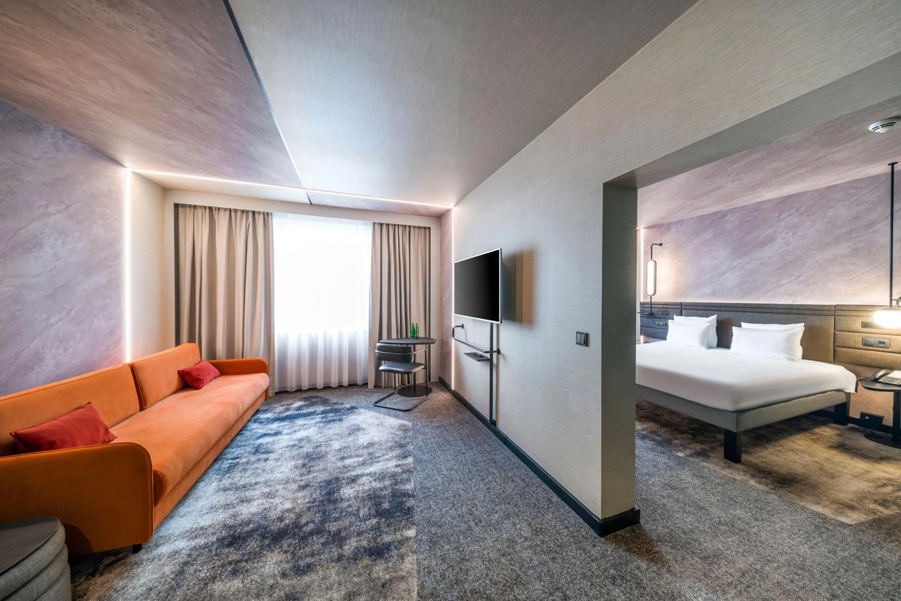 Living room, Bed in Novotel Praha Wenceslas Square