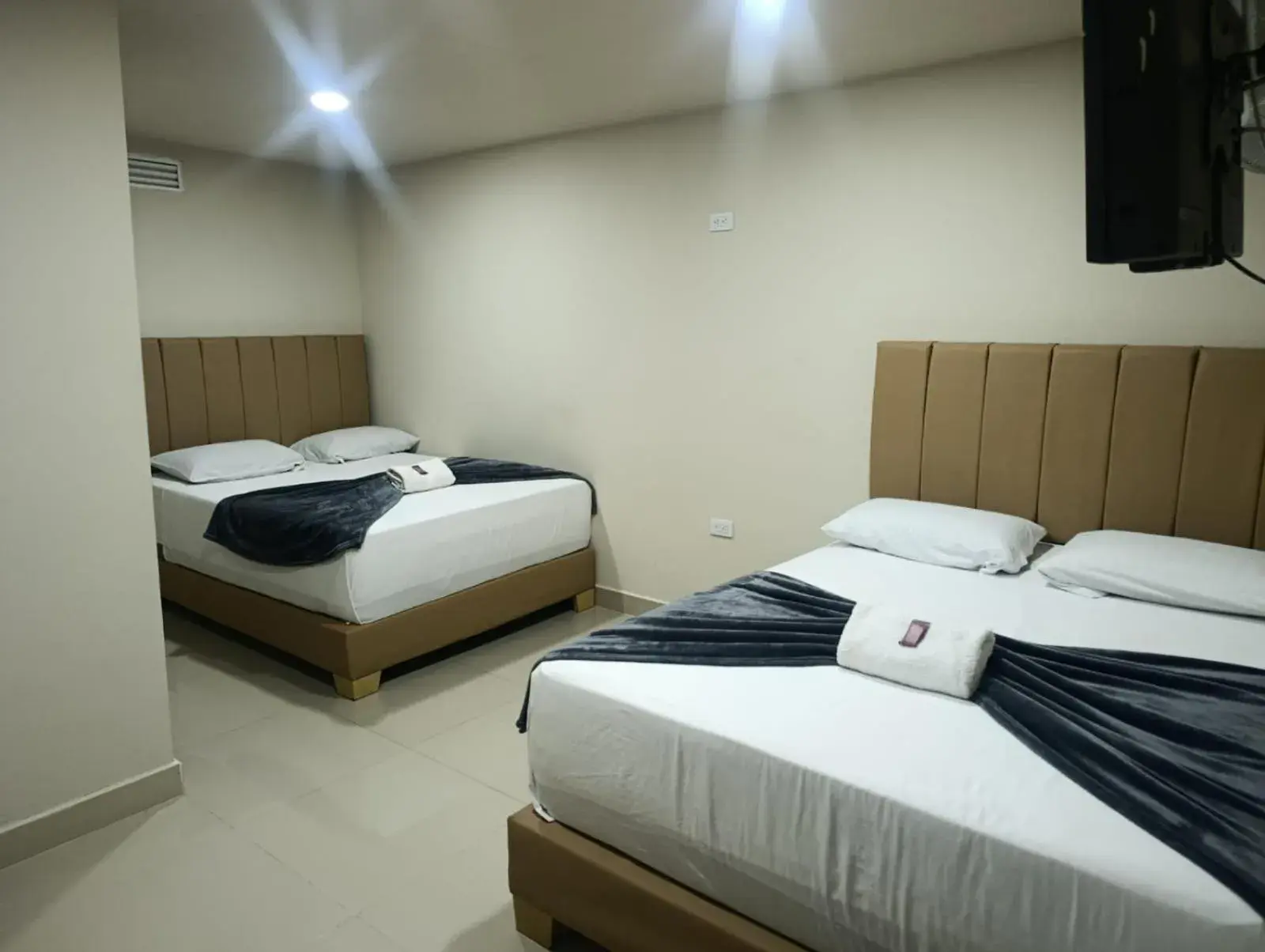 Deluxe Triple Room in Hotel Select Medellin Deluxe Triple Room in Hotel Select Medellin