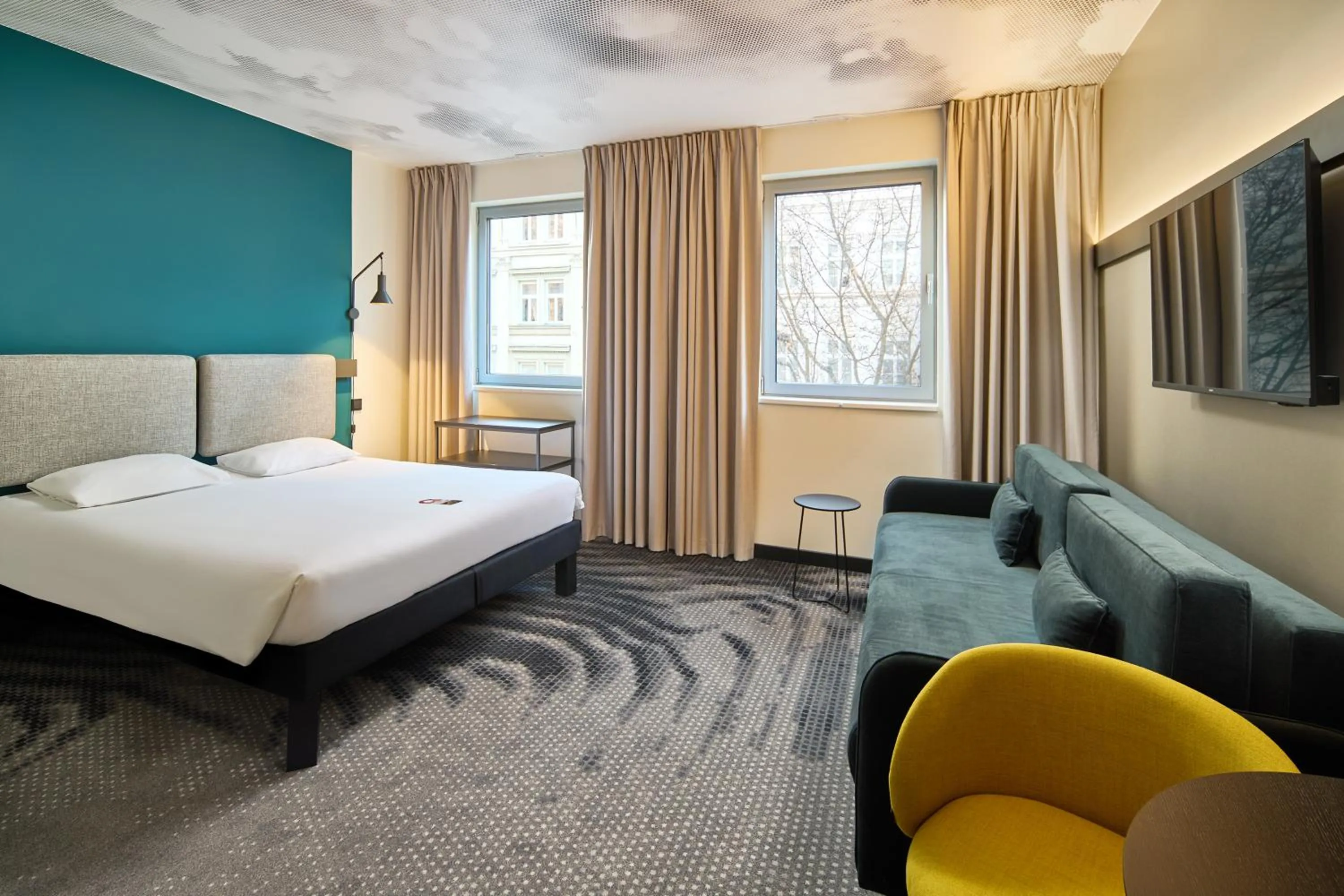 Seating area, Bed in Ibis Praha Wenceslas Square