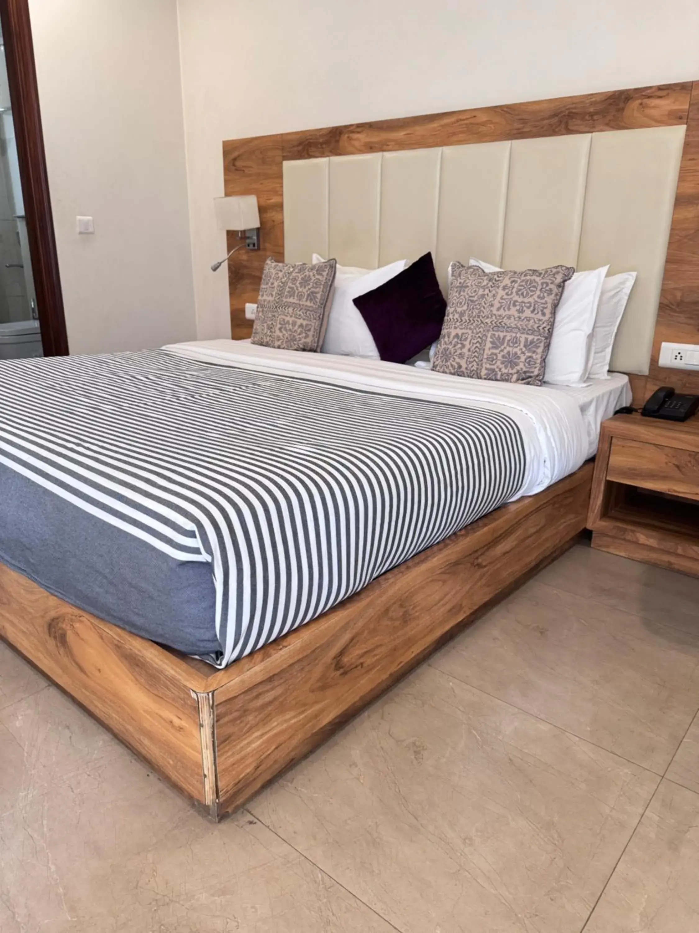 Photo of the whole room, Bed in Hotel Golf View Suites-Golf Course Road Gurgaon Photo of the whole room, Bed in Hotel Golf View Suites-Golf Course Road Gurgaon