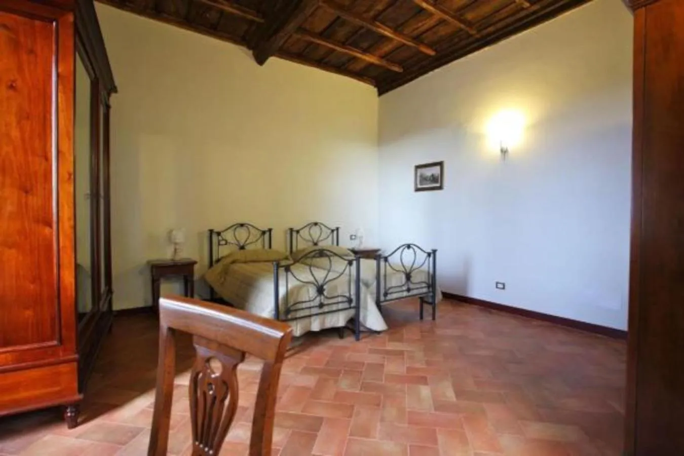 Bed in Antico Borgo La Commenda