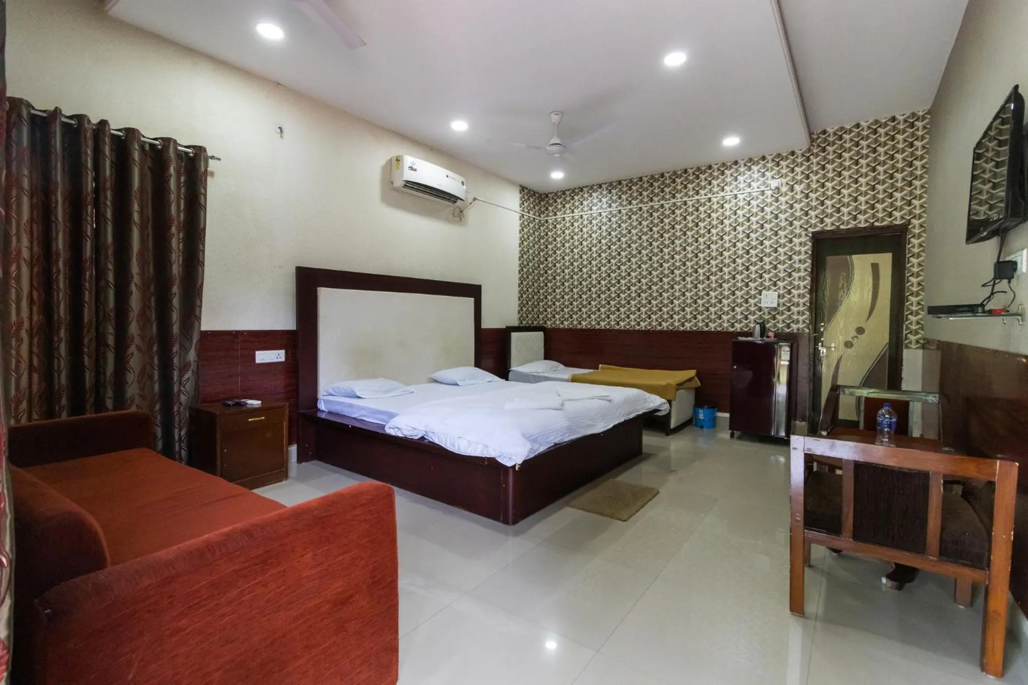 Photo of the whole room, Bed in Vrindavan Gopala Resort